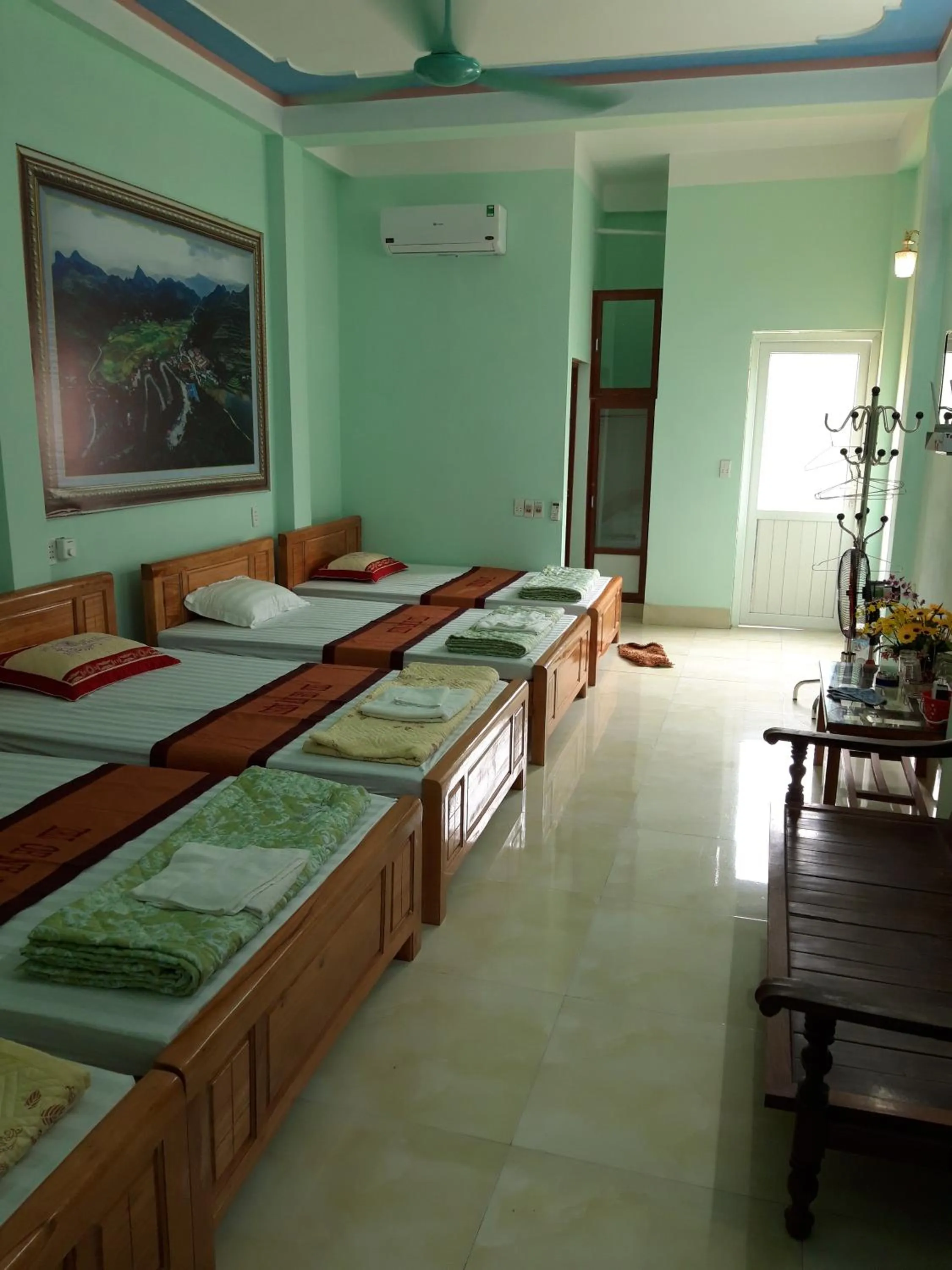 Bed in Yen Minh Hotel Thien An