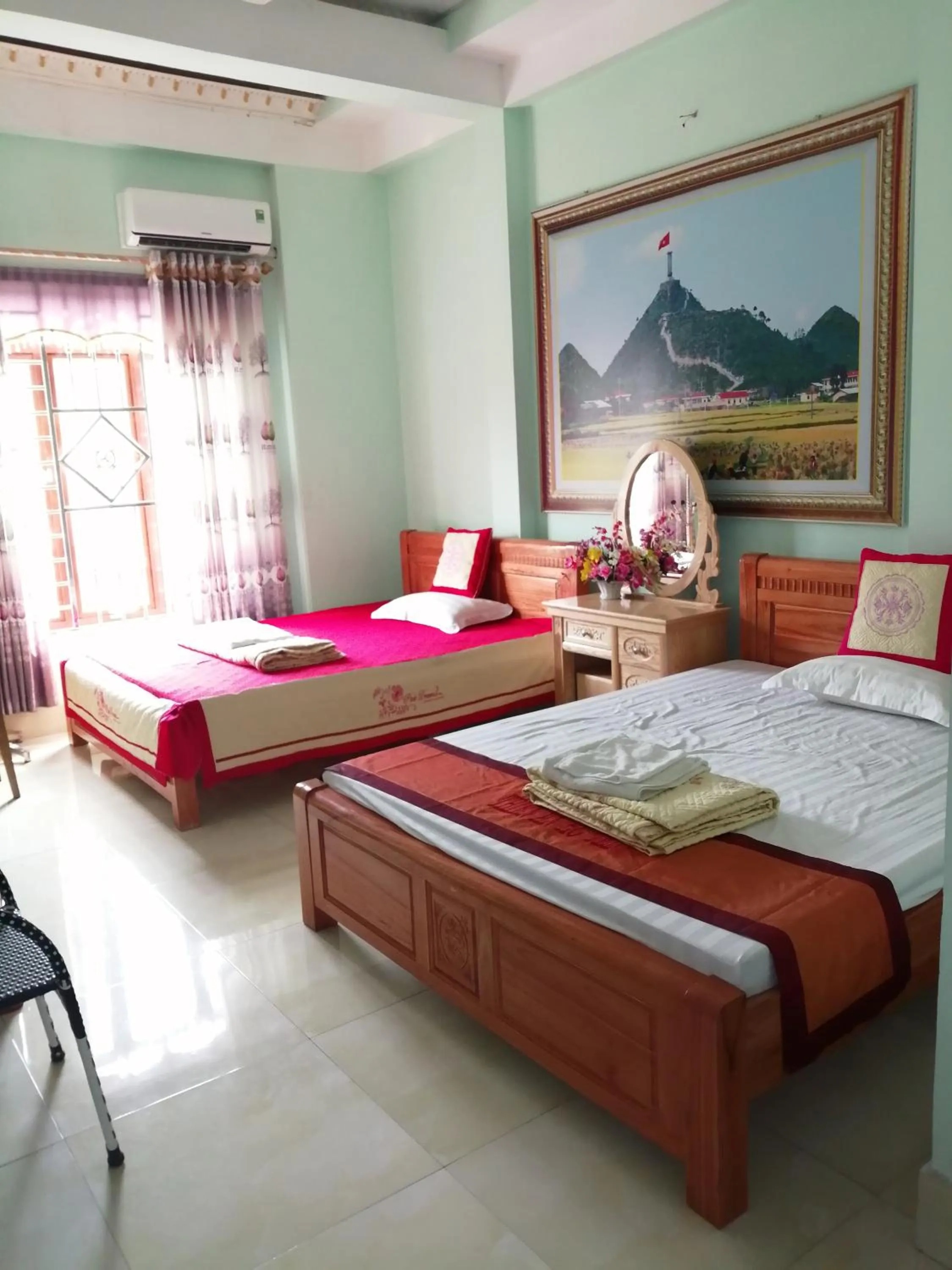 Bed in Yen Minh Hotel Thien An