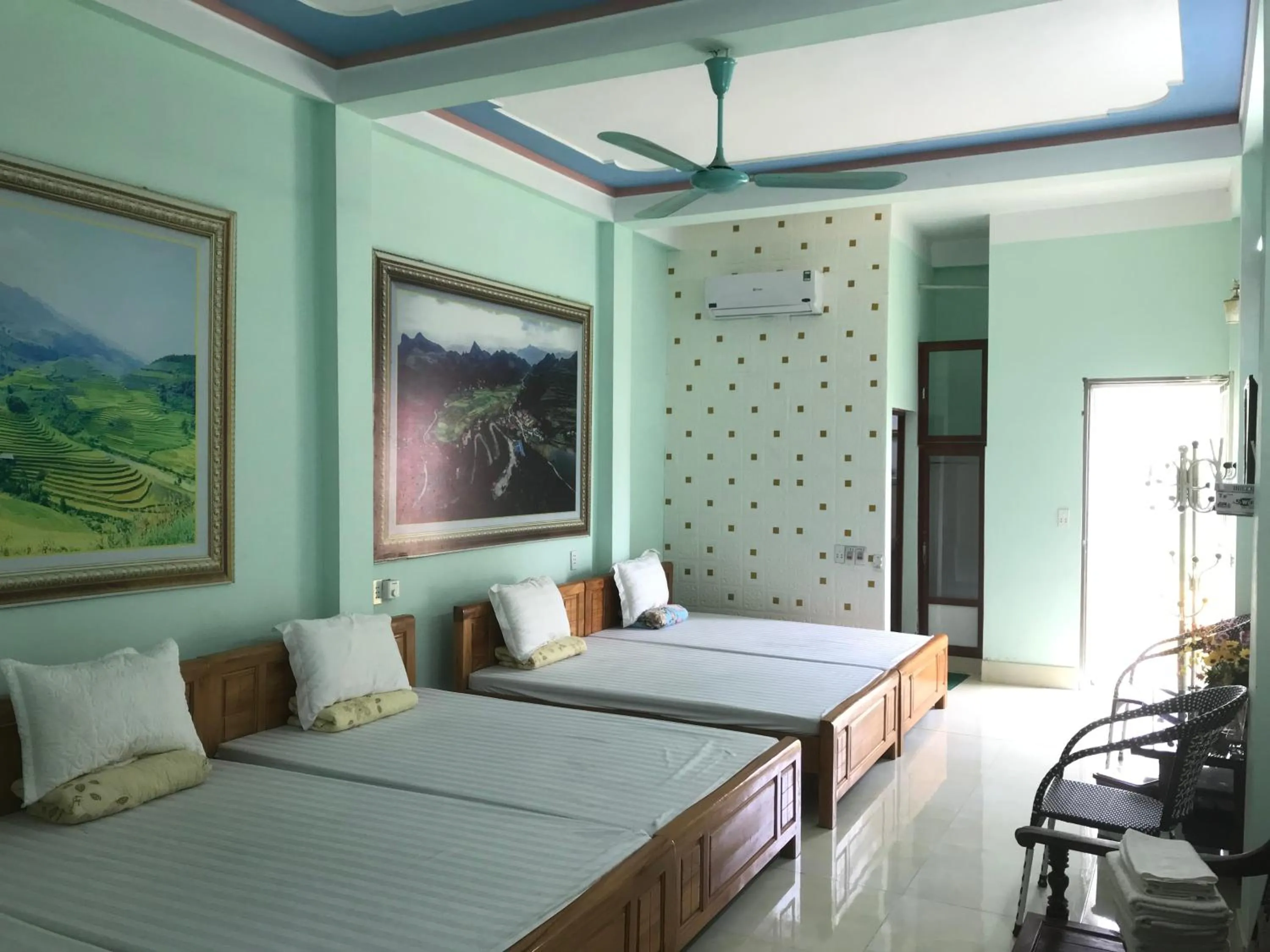 Bed in Yen Minh Hotel Thien An