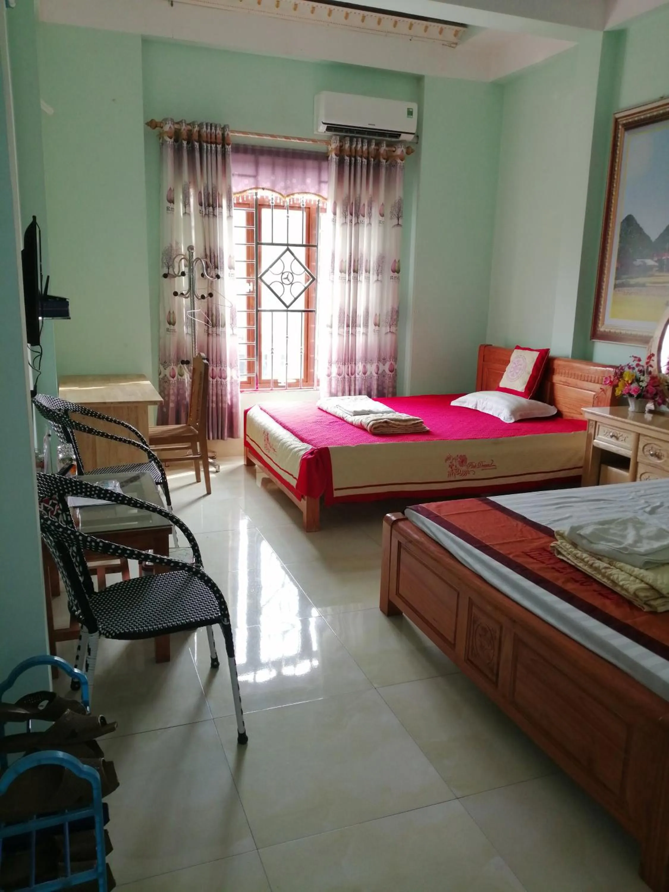 Bed in Yen Minh Hotel Thien An