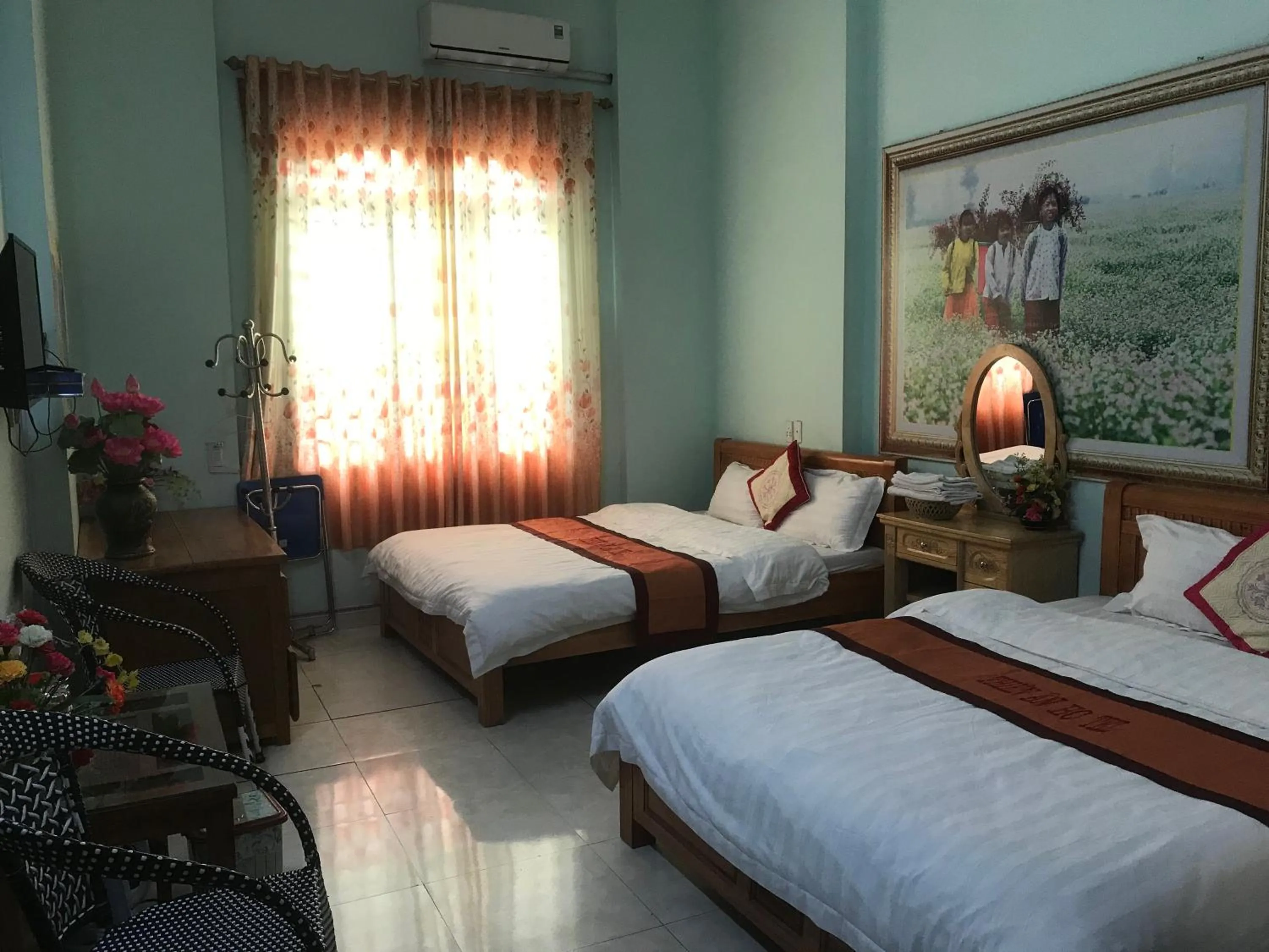 Bed in Yen Minh Hotel Thien An