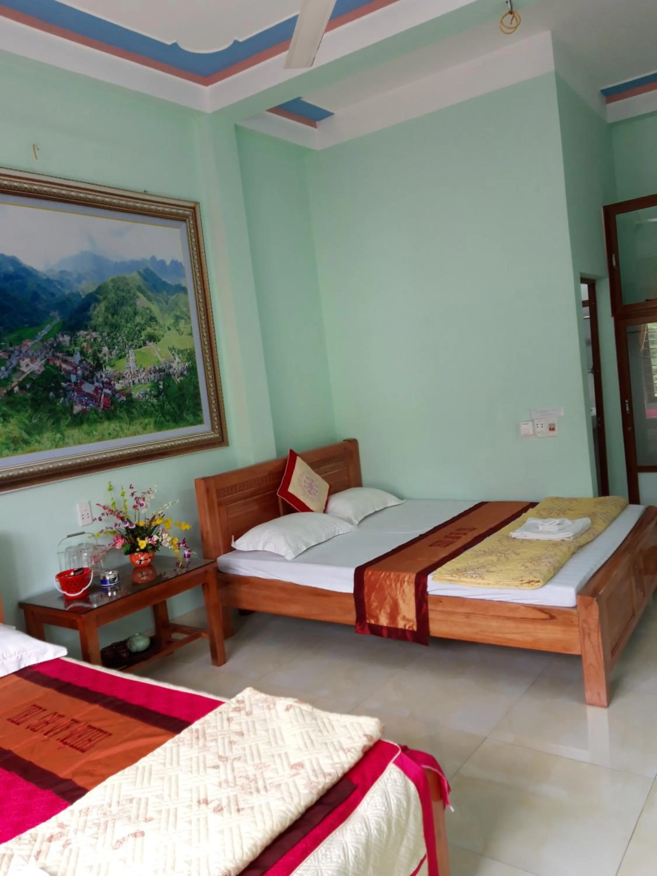 Bed in Yen Minh Hotel Thien An