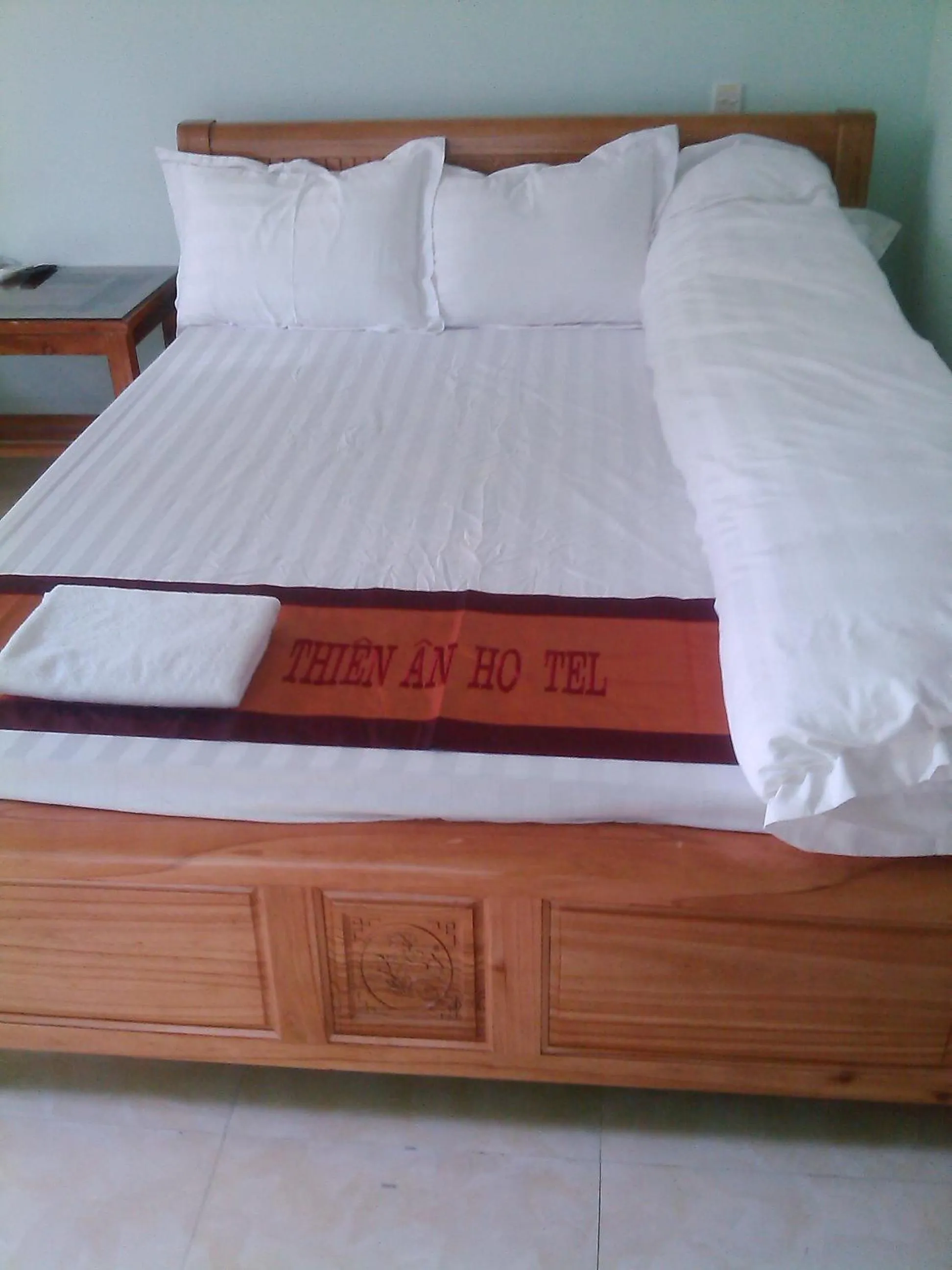Bed in Yen Minh Hotel Thien An