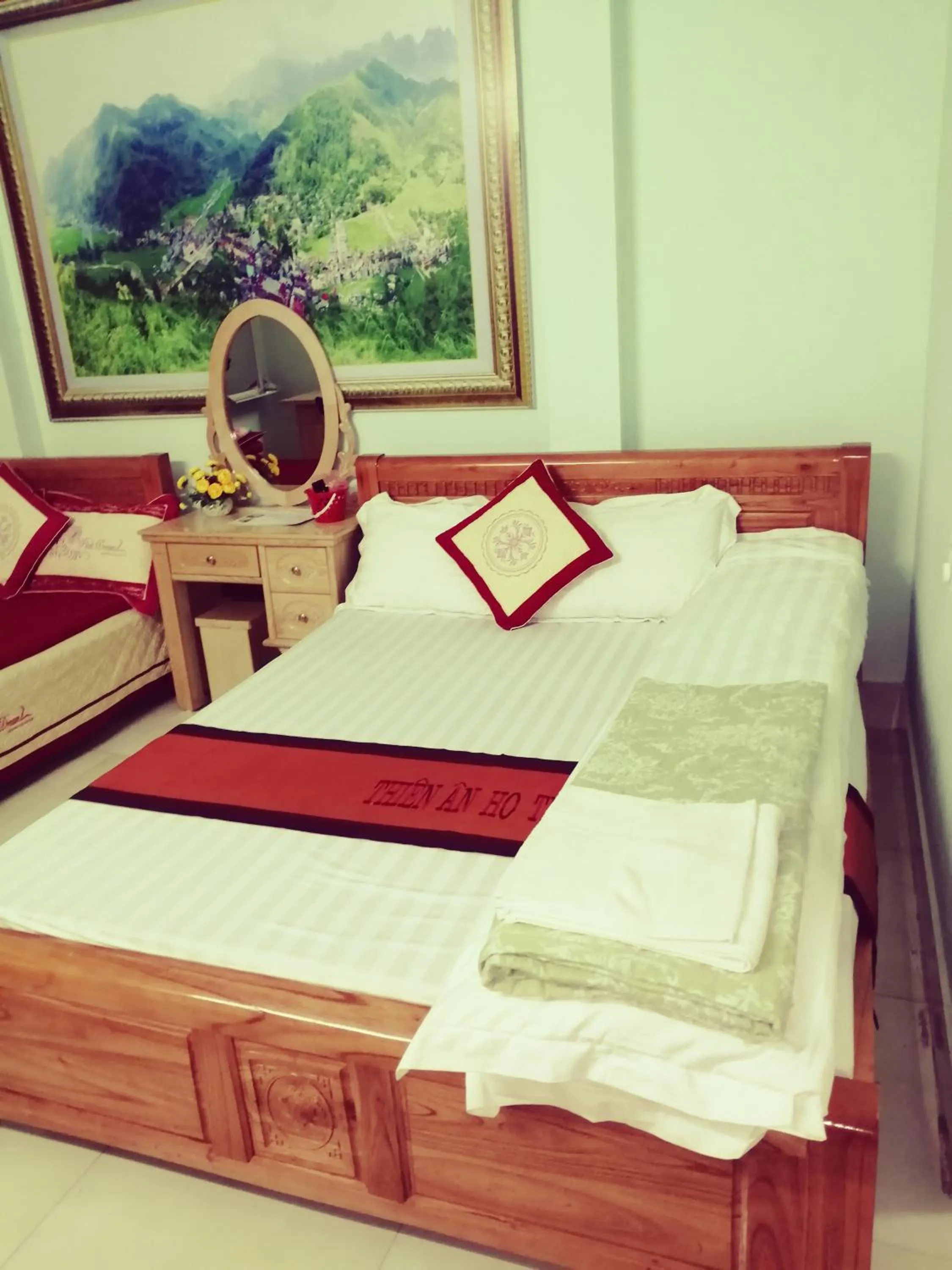 Bed in Yen Minh Hotel Thien An