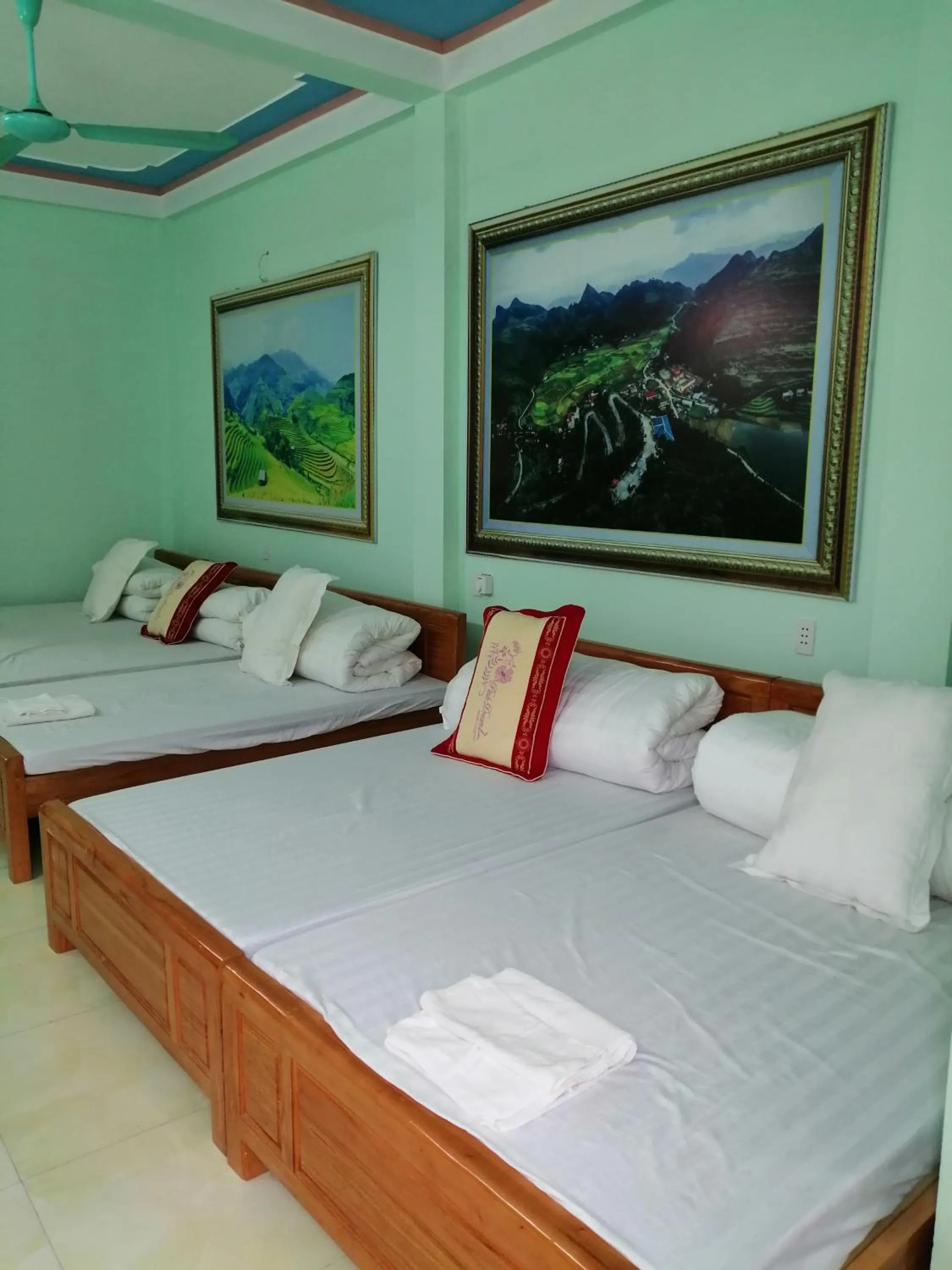 Bed in Yen Minh Hotel Thien An