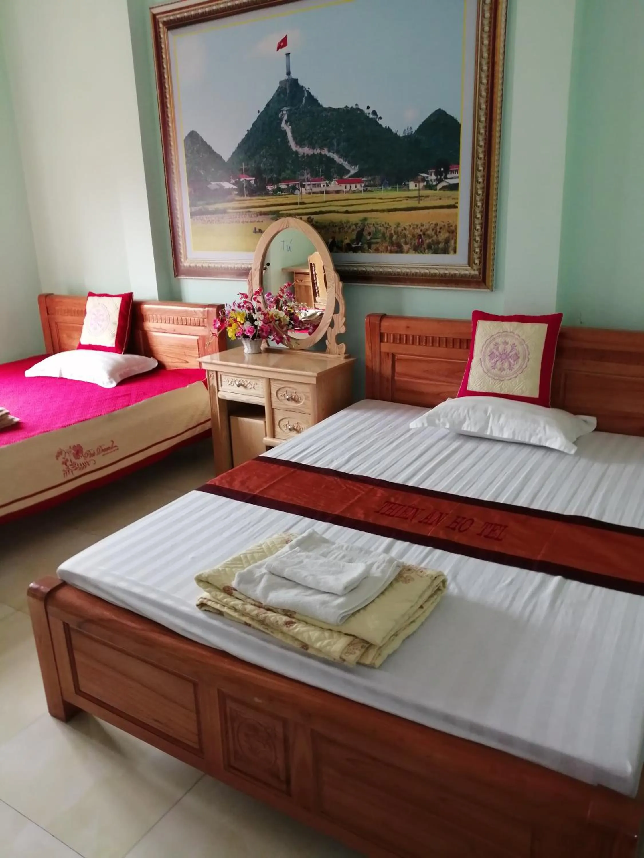 Bed in Yen Minh Hotel Thien An