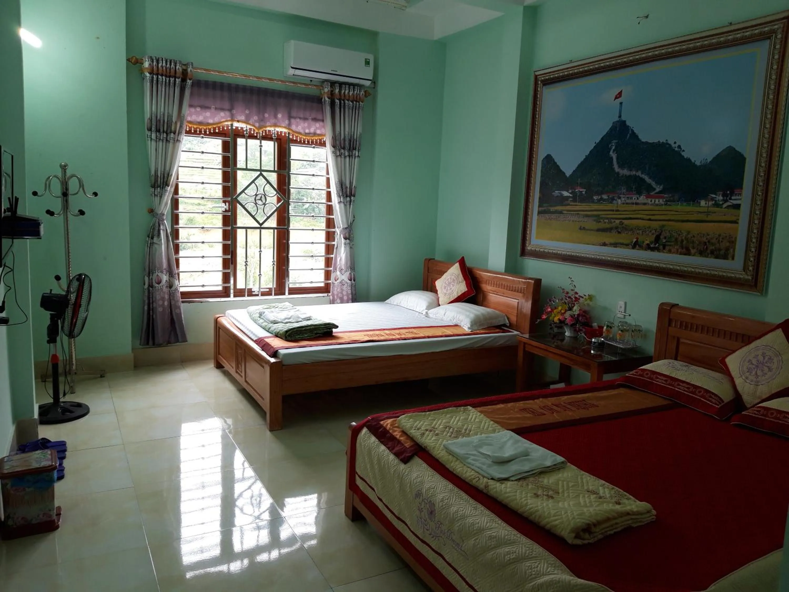 Bed in Yen Minh Hotel Thien An