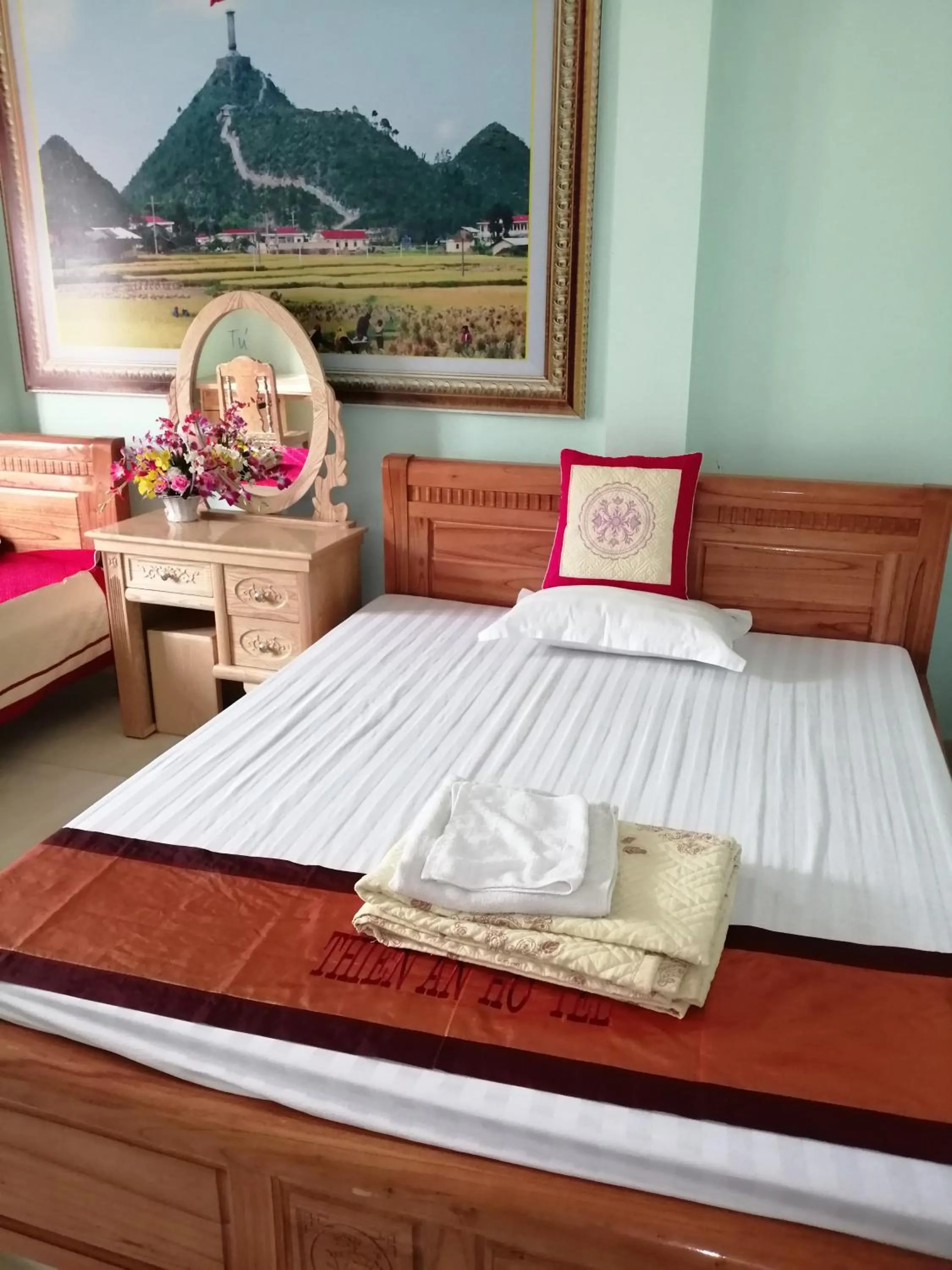 Bed in Yen Minh Hotel Thien An