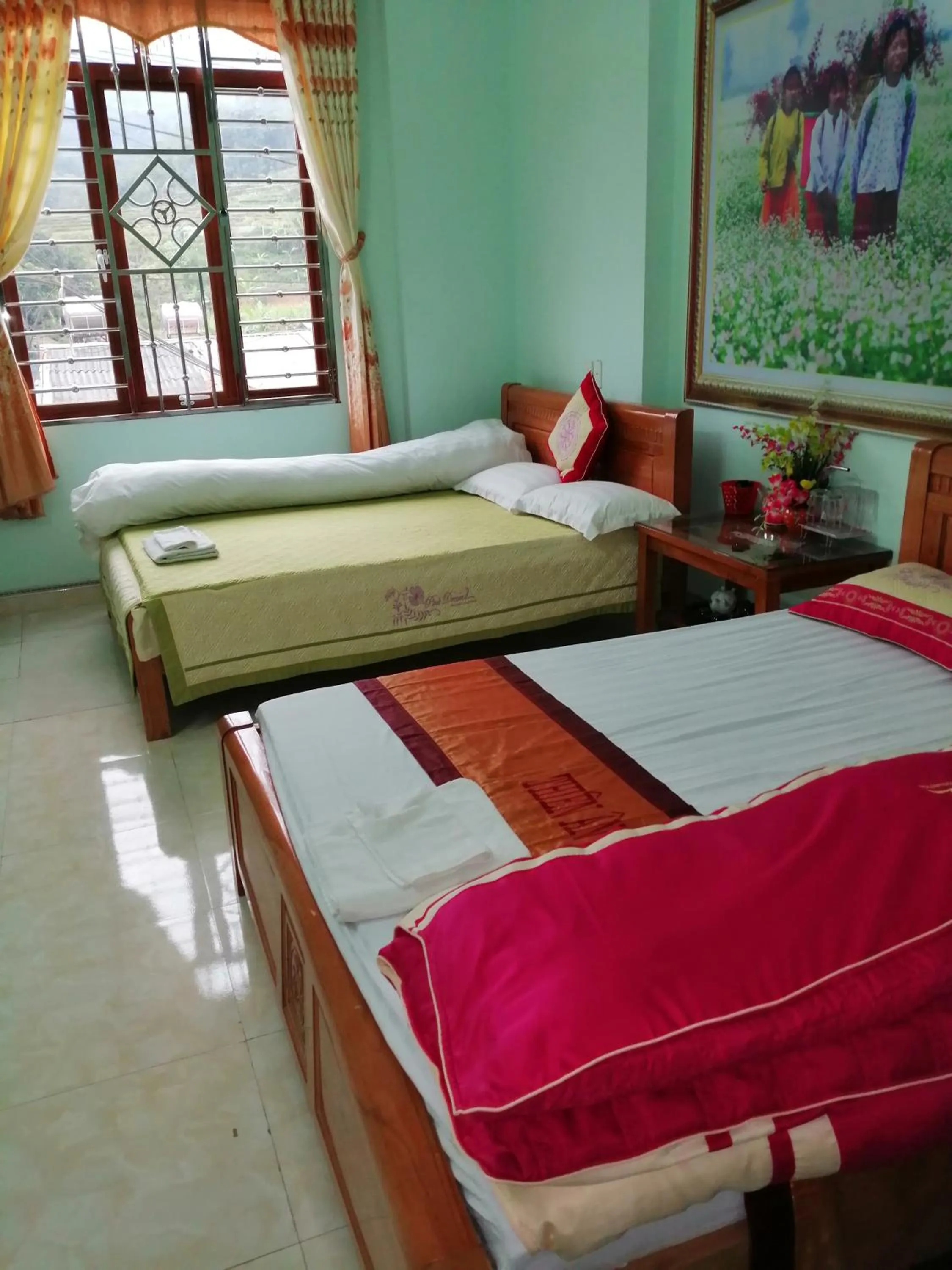 Bed in Yen Minh Hotel Thien An