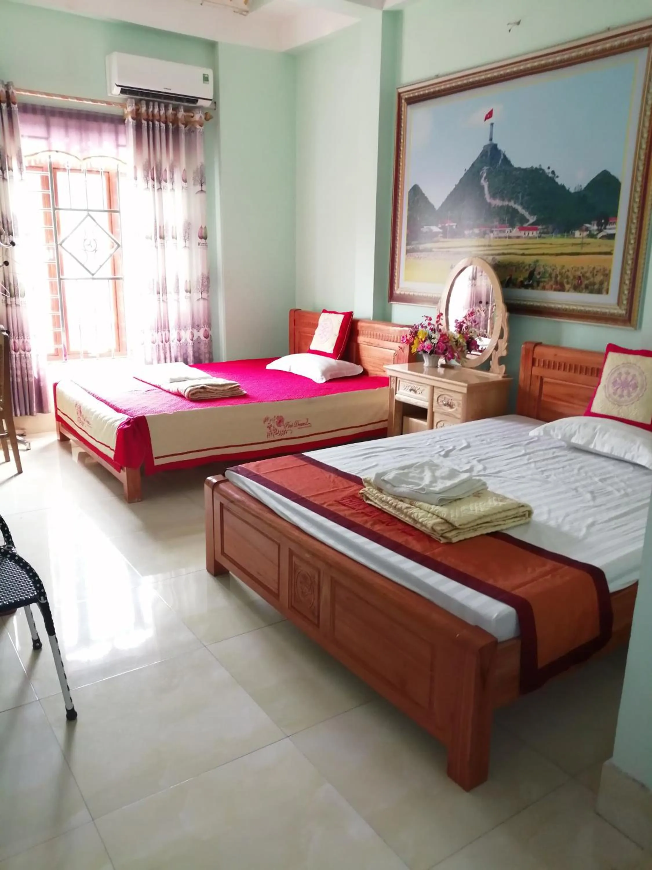 Bed in Yen Minh Hotel Thien An