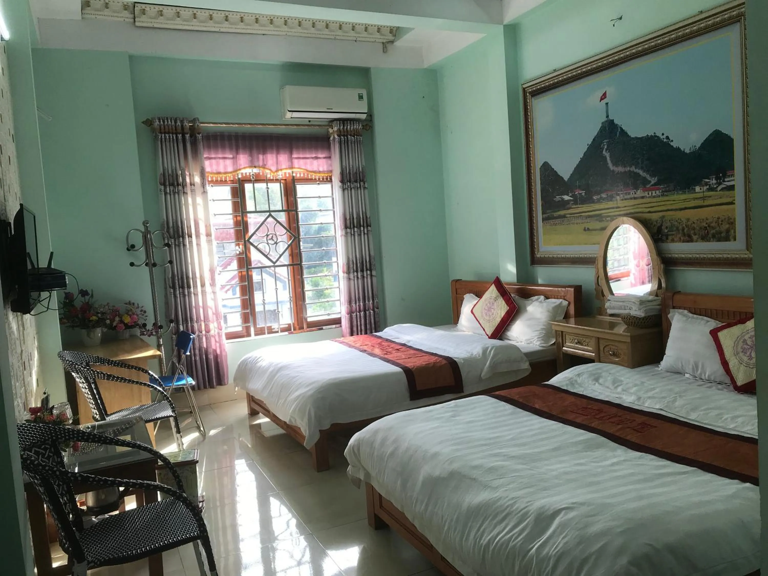 Bed in Yen Minh Hotel Thien An