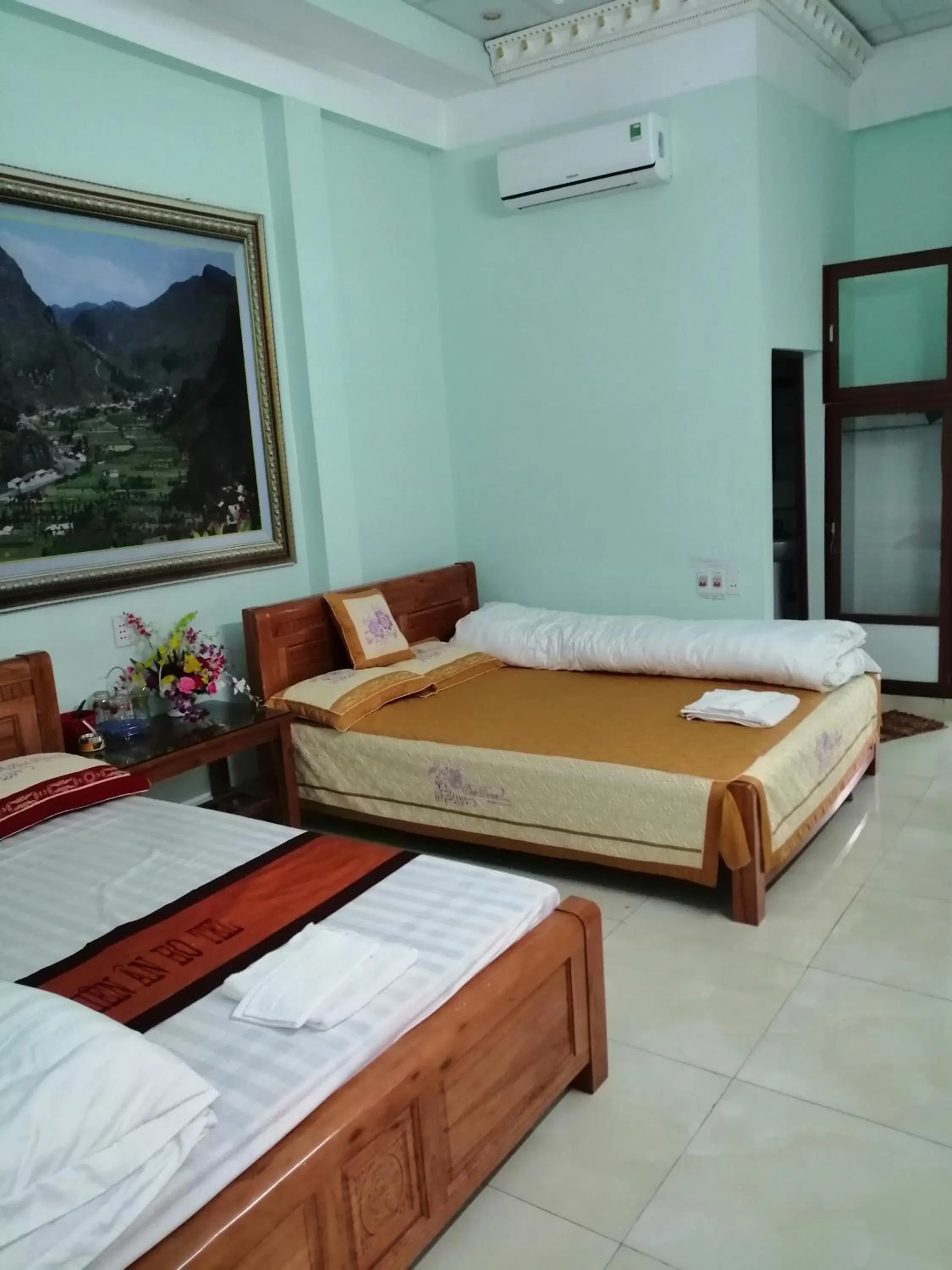 Bed in Yen Minh Hotel Thien An