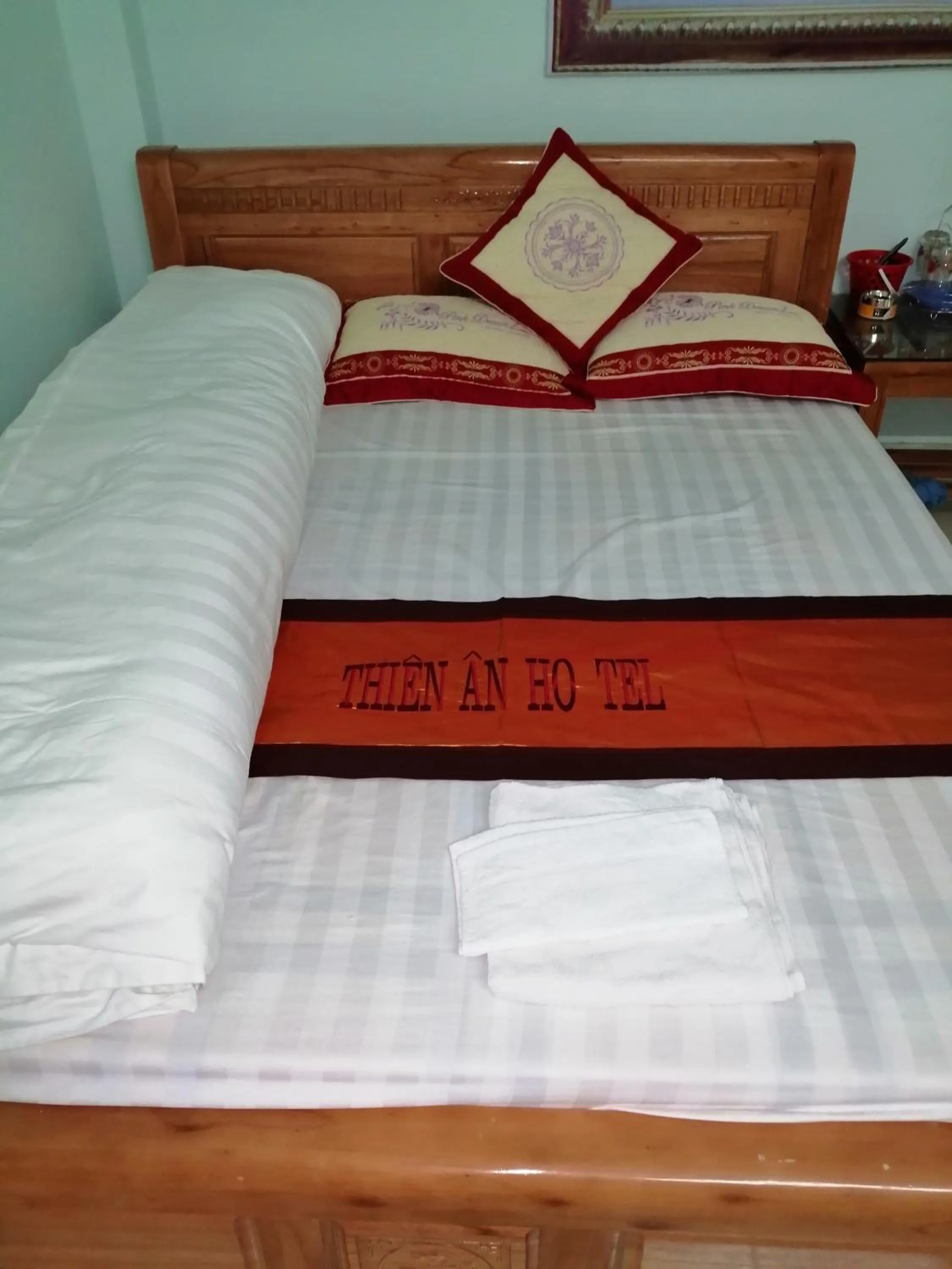 Bed in Yen Minh Hotel Thien An