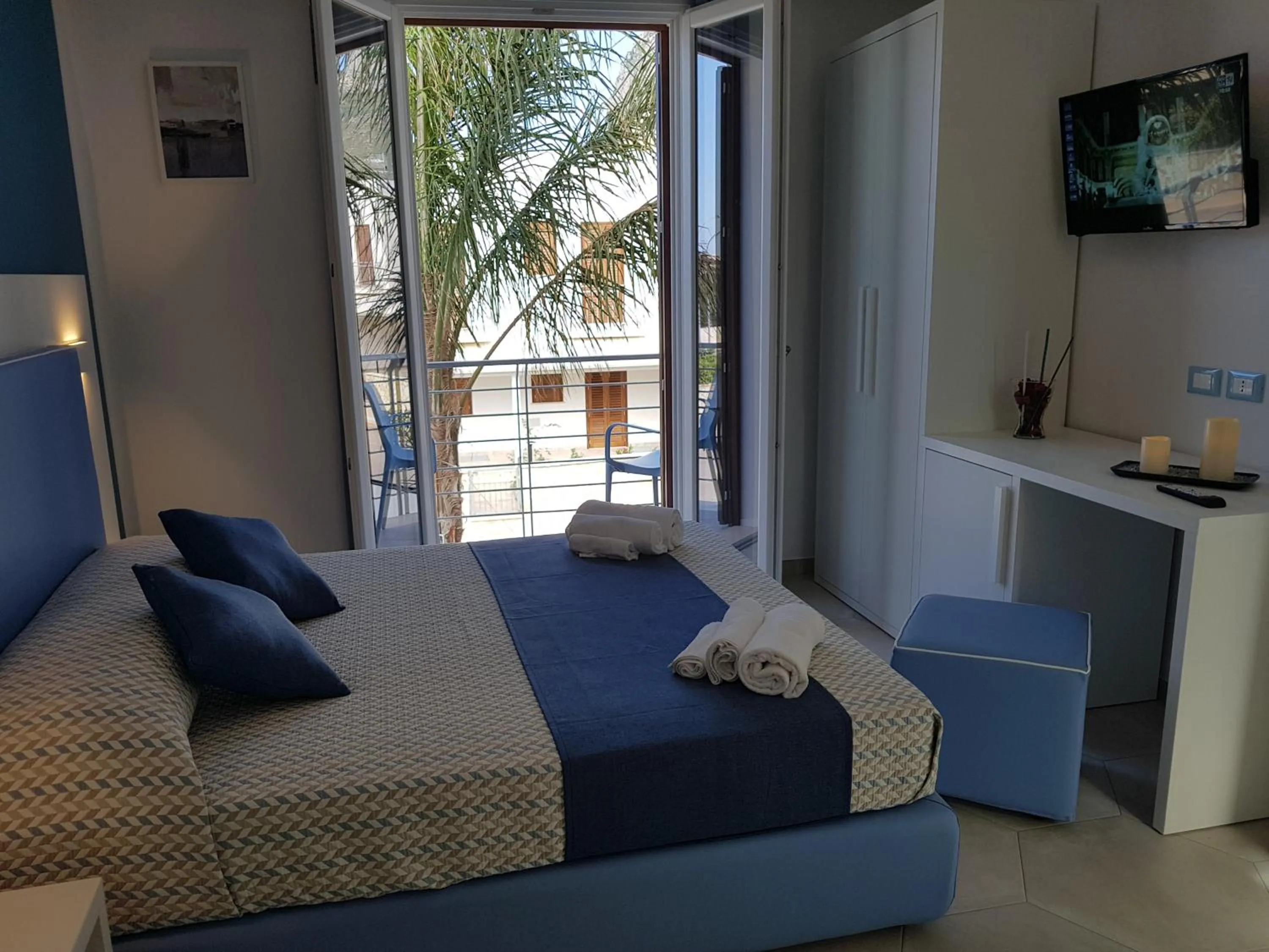 Bed in B&B Aloe Comfort Rooms