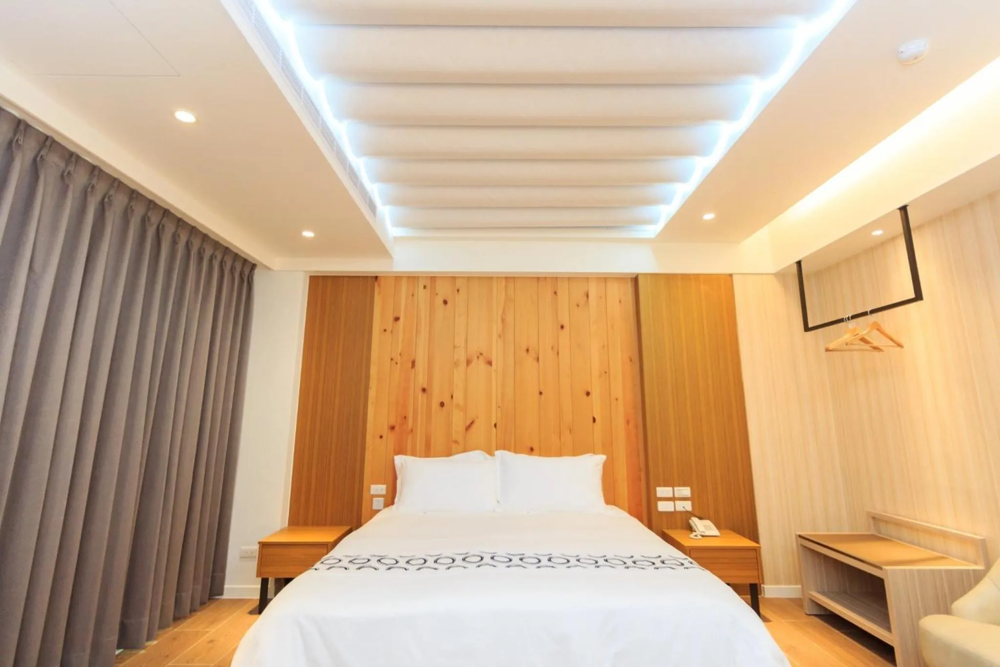 Bed in Urban Oasis Inn