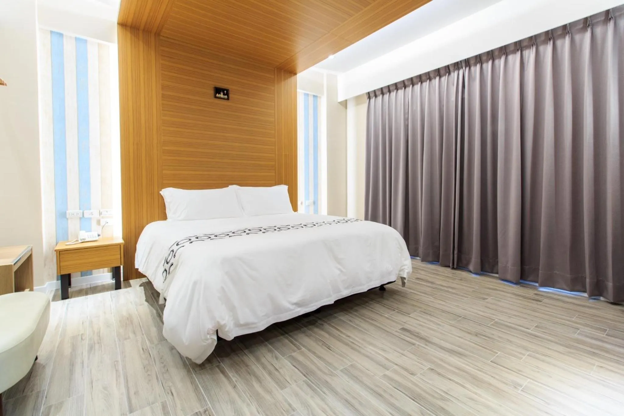 Bed in Urban Oasis Inn