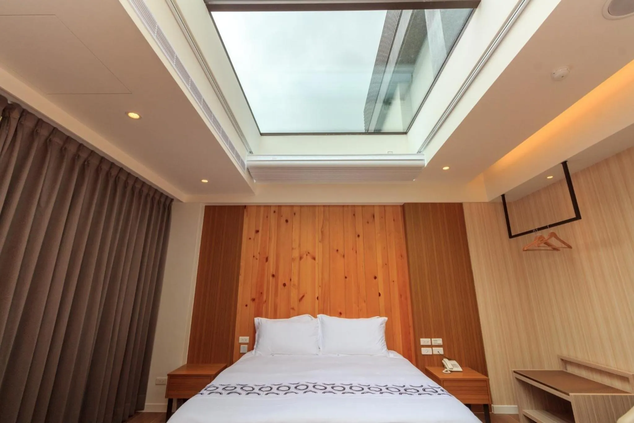 Bed in Urban Oasis Inn