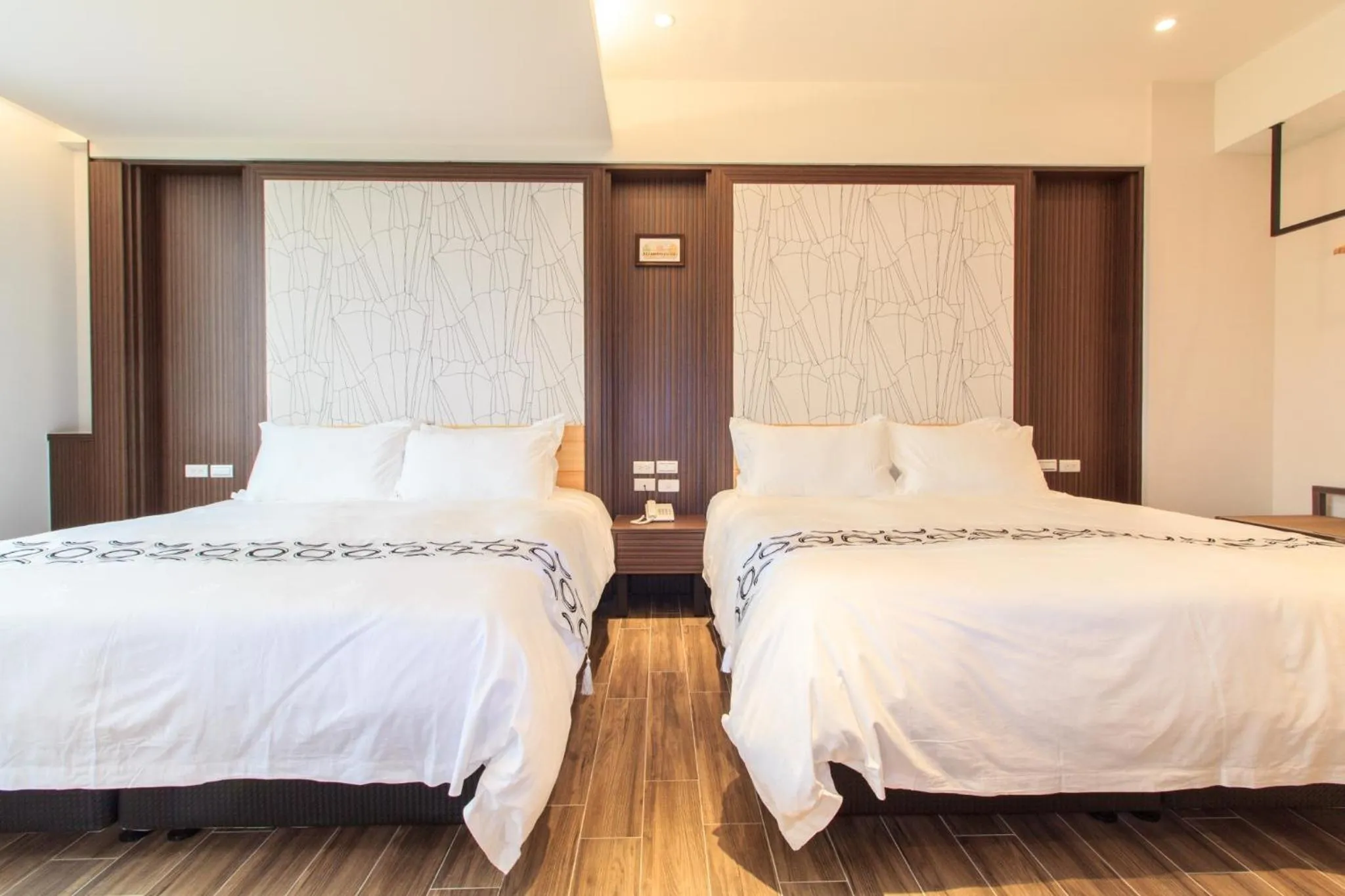 Bed in Urban Oasis Inn