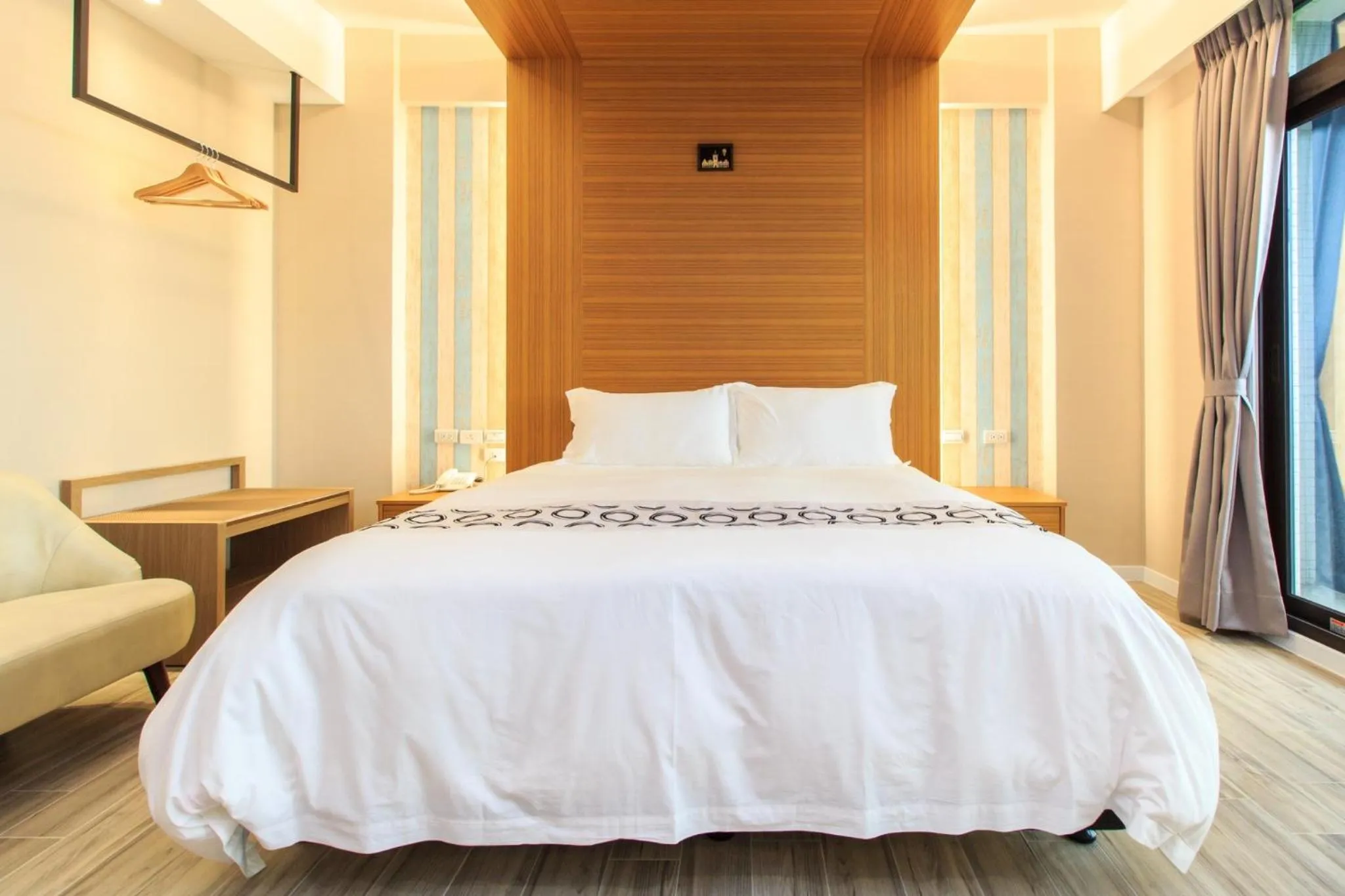 Bed in Urban Oasis Inn