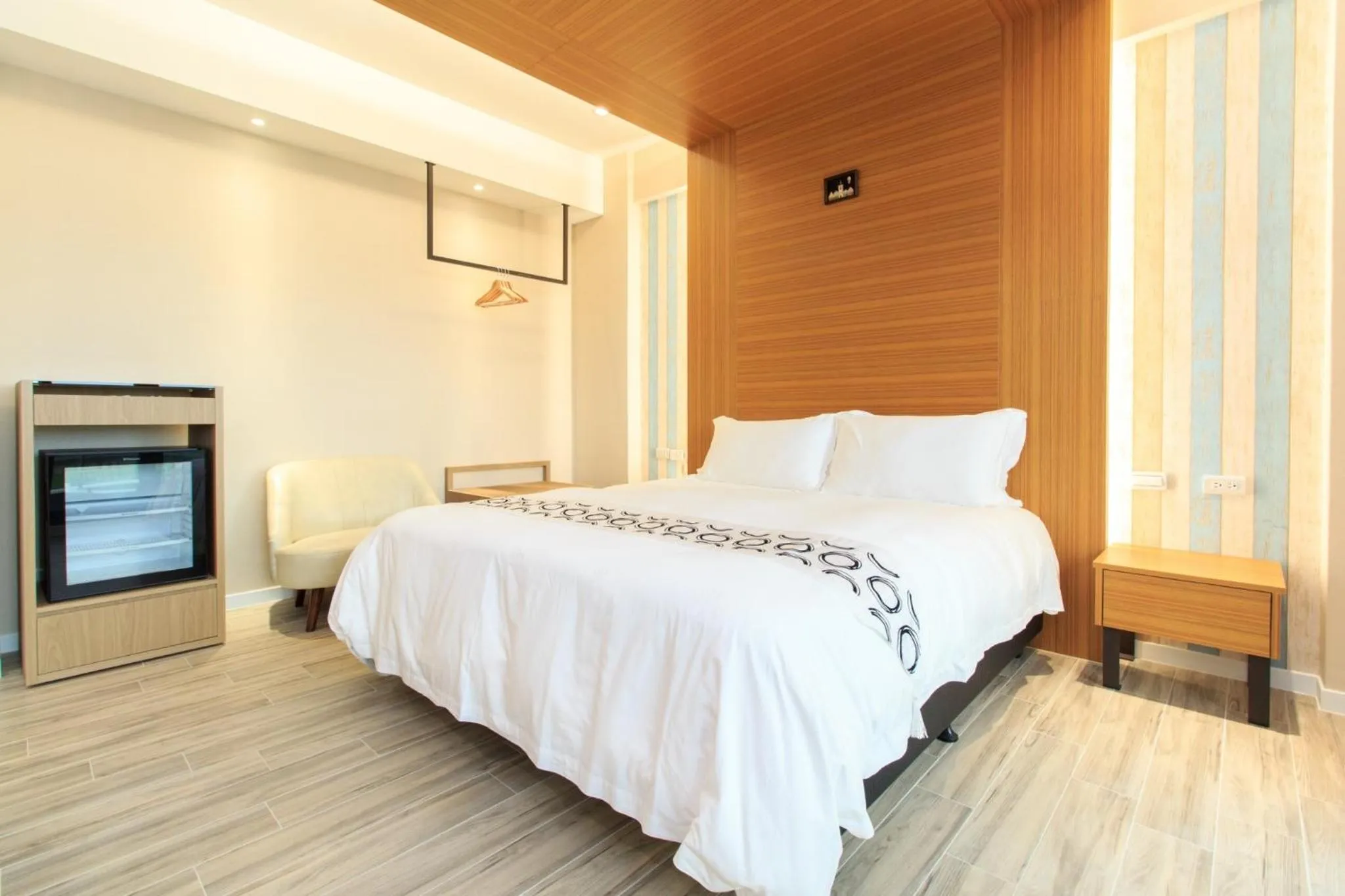 Bed in Urban Oasis Inn