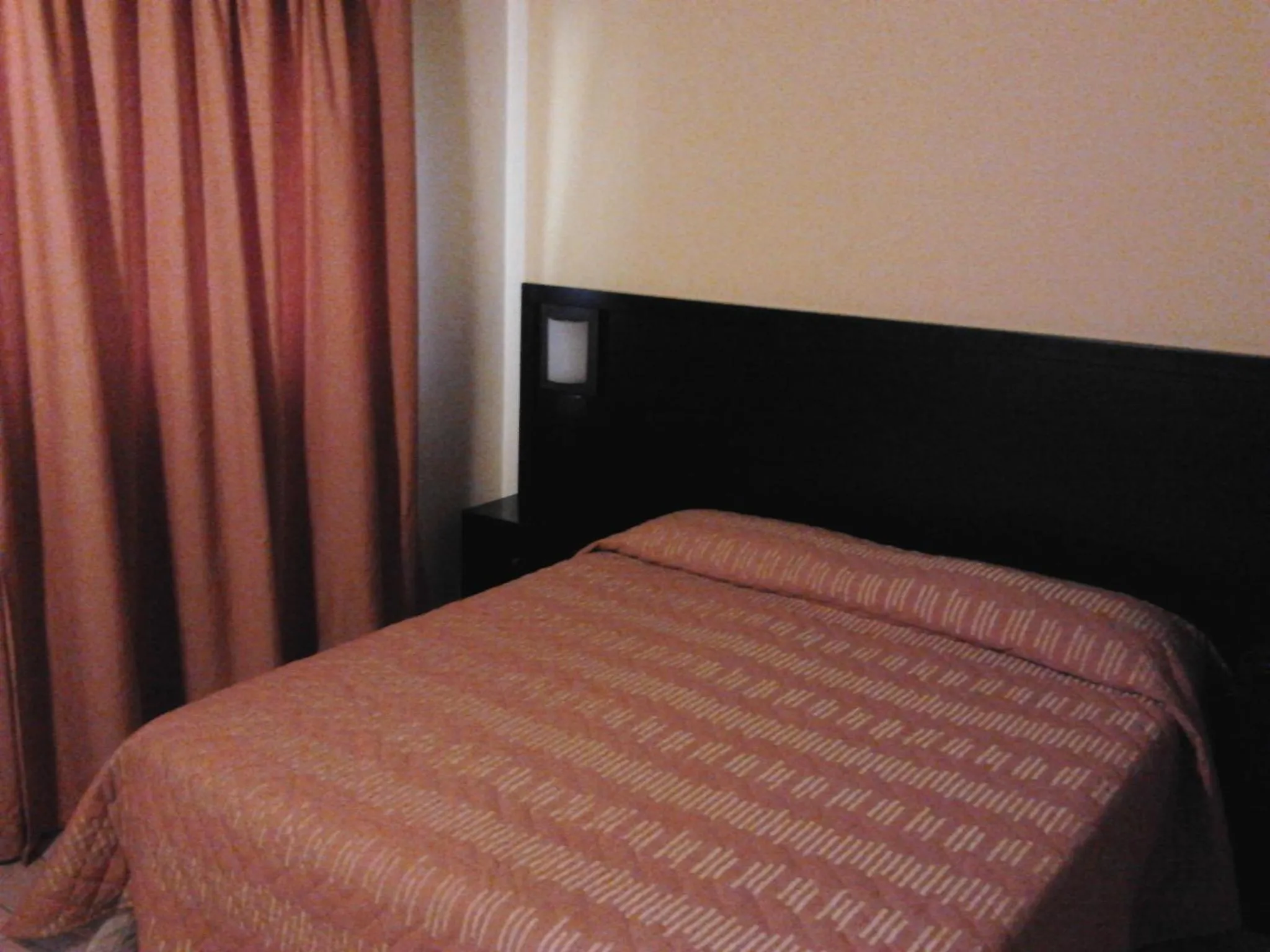 Bed in AgriHotel Papaya