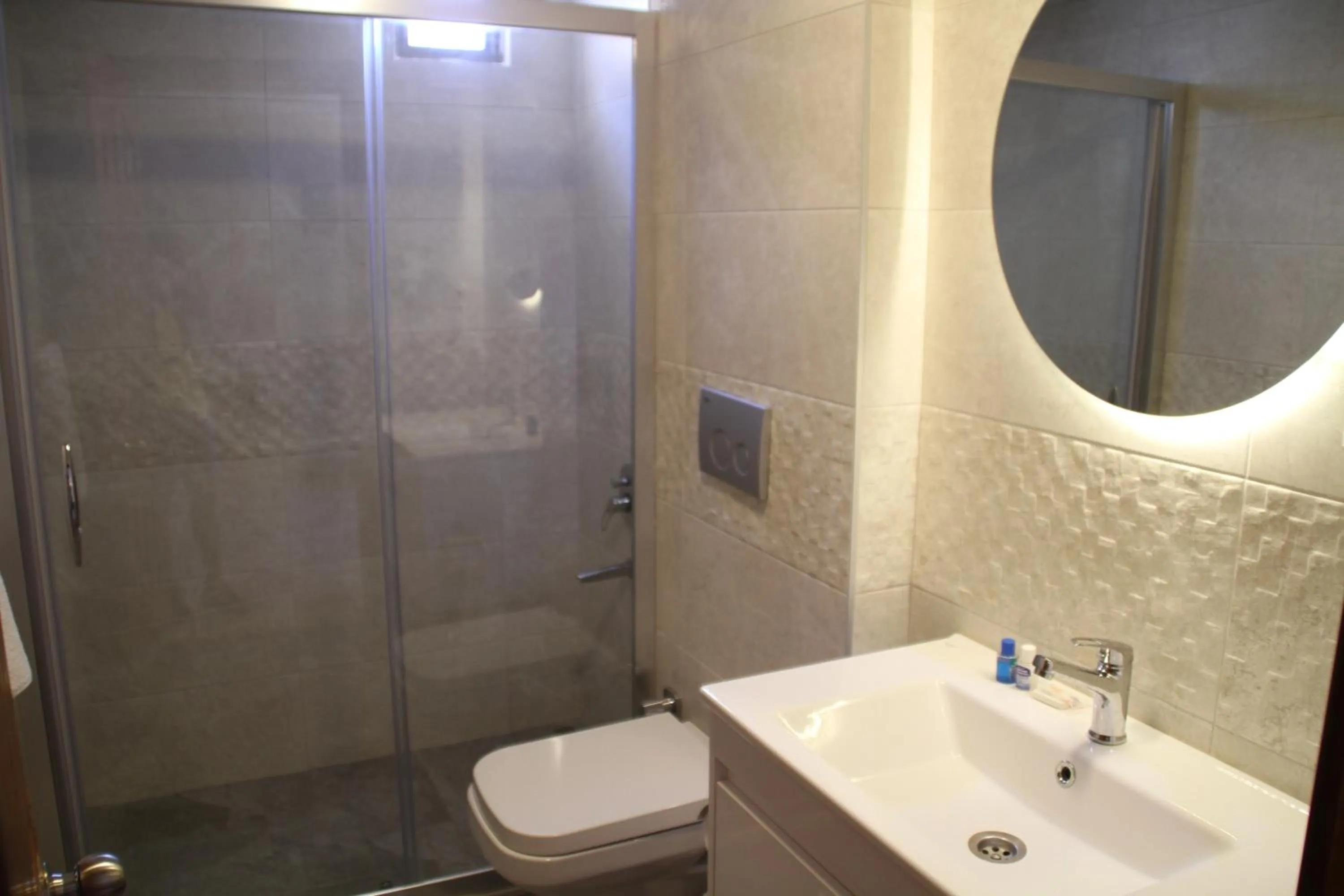 Bathroom in Rosy Suites Hotel