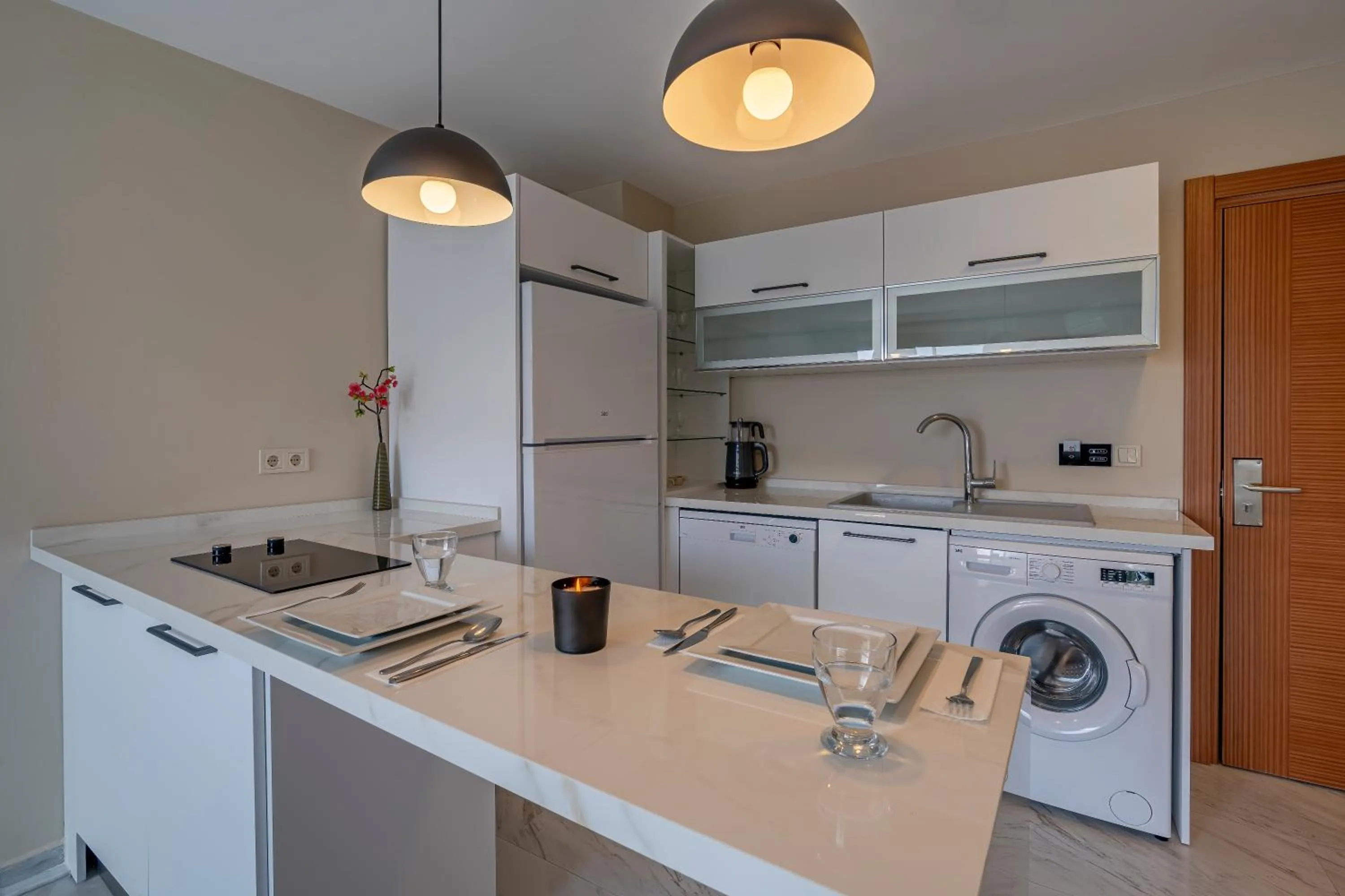 Kitchen or kitchenette in Rosy Suites Hotel