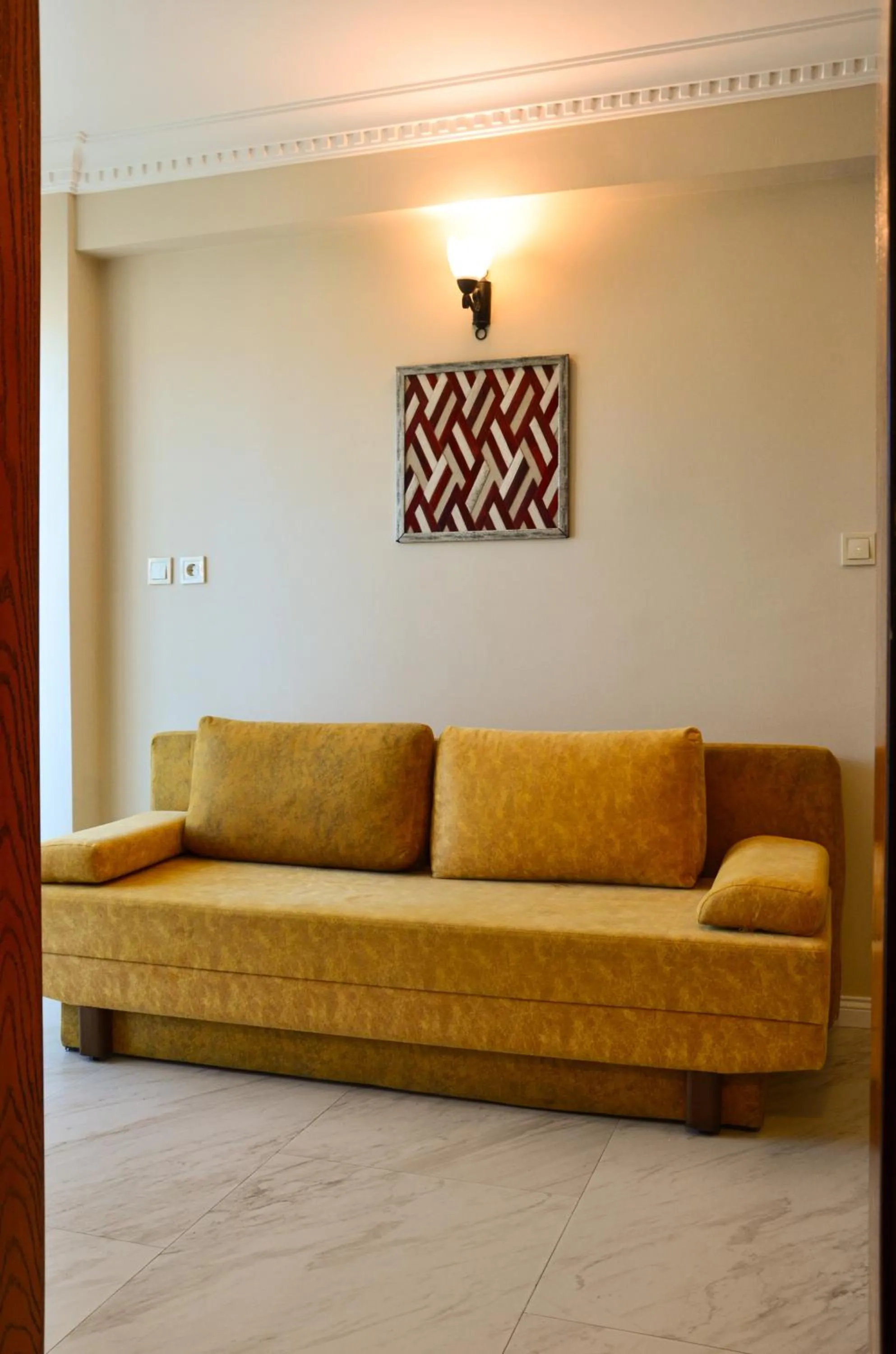 Seating area in Rosy Suites Hotel