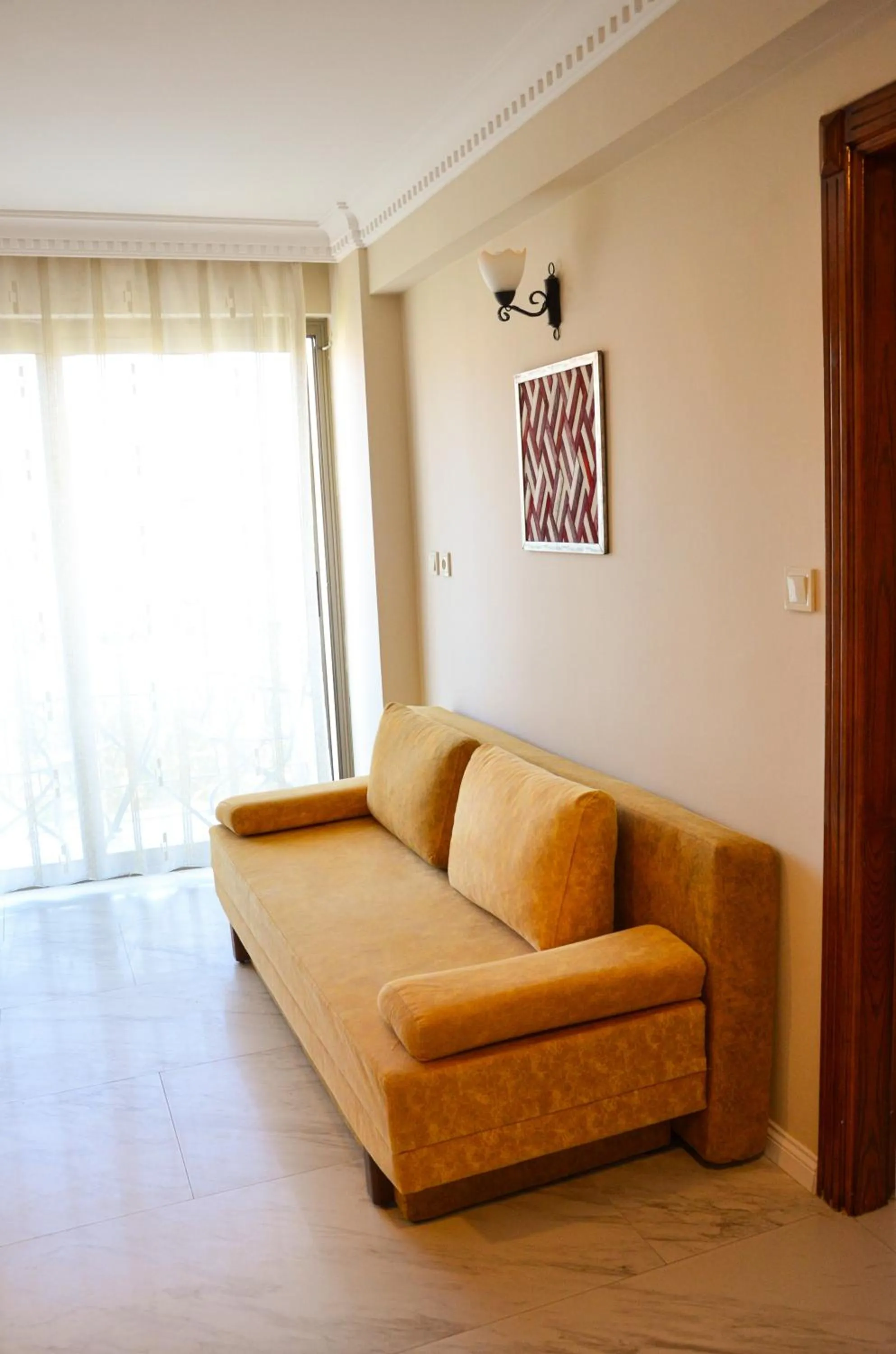Seating area in Rosy Suites Hotel