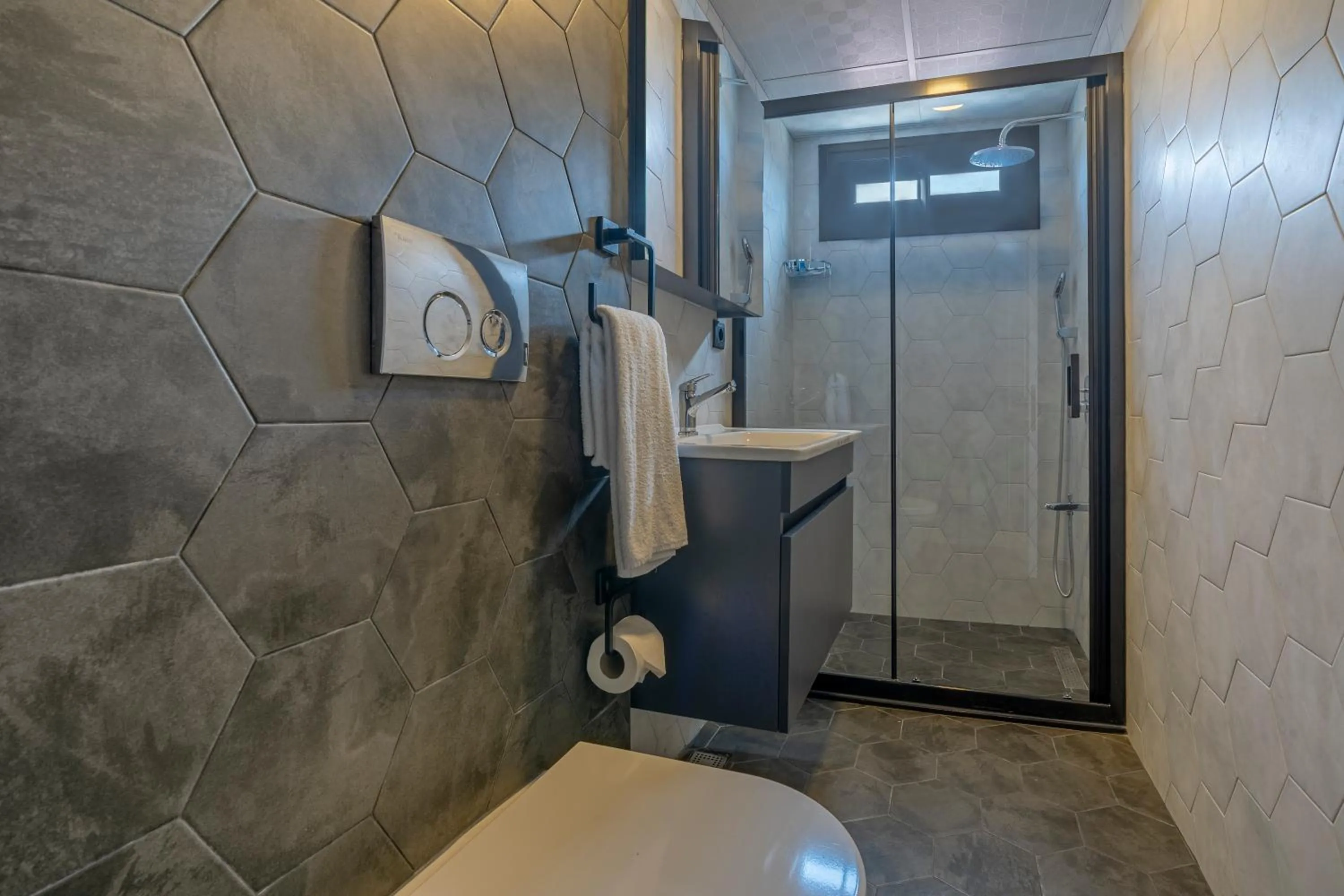 Bathroom in Rosy Suites Hotel