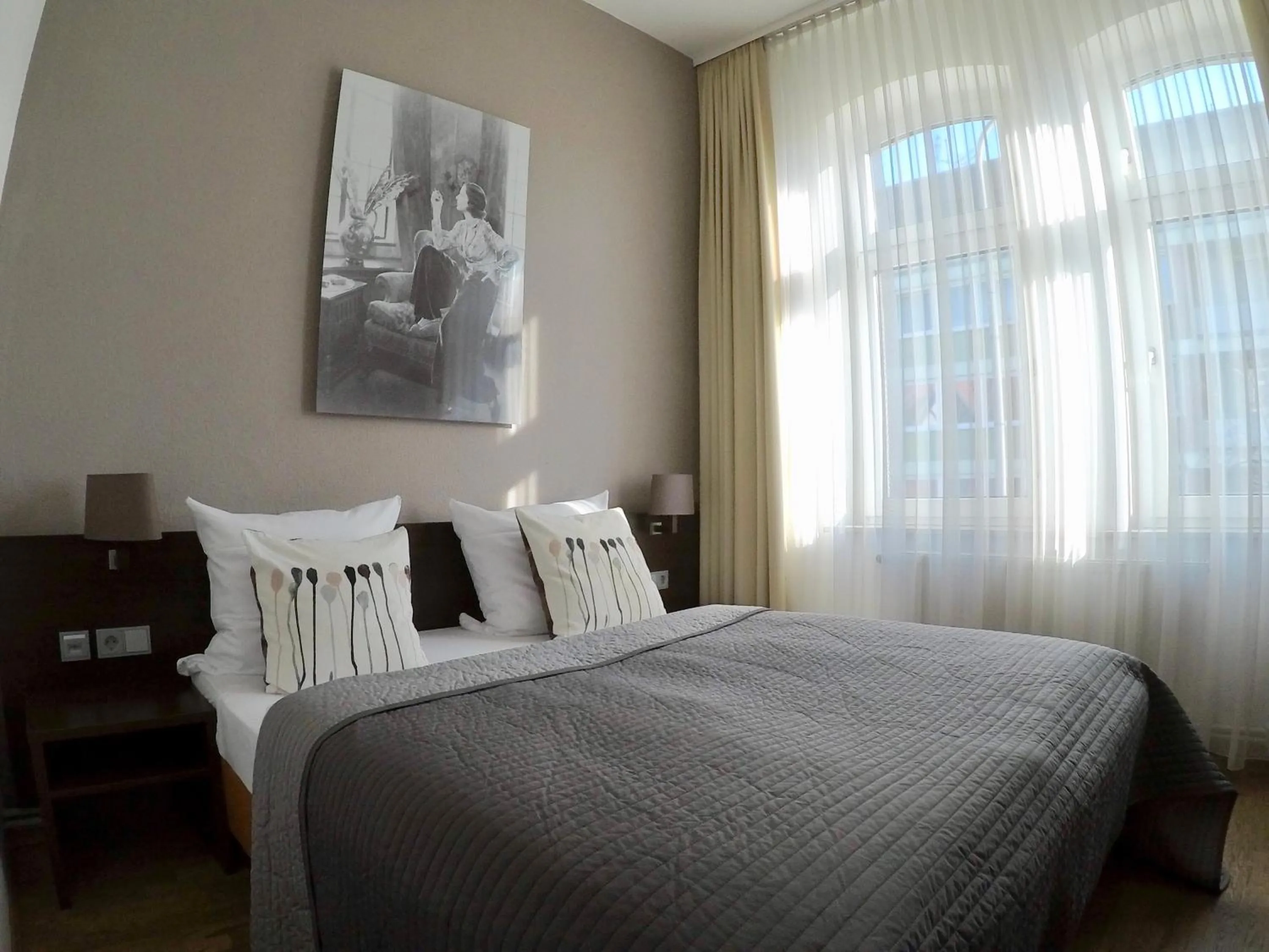 Photo of the whole room, Bed in DAS Steeps Ihr Brauhaus und Hotel