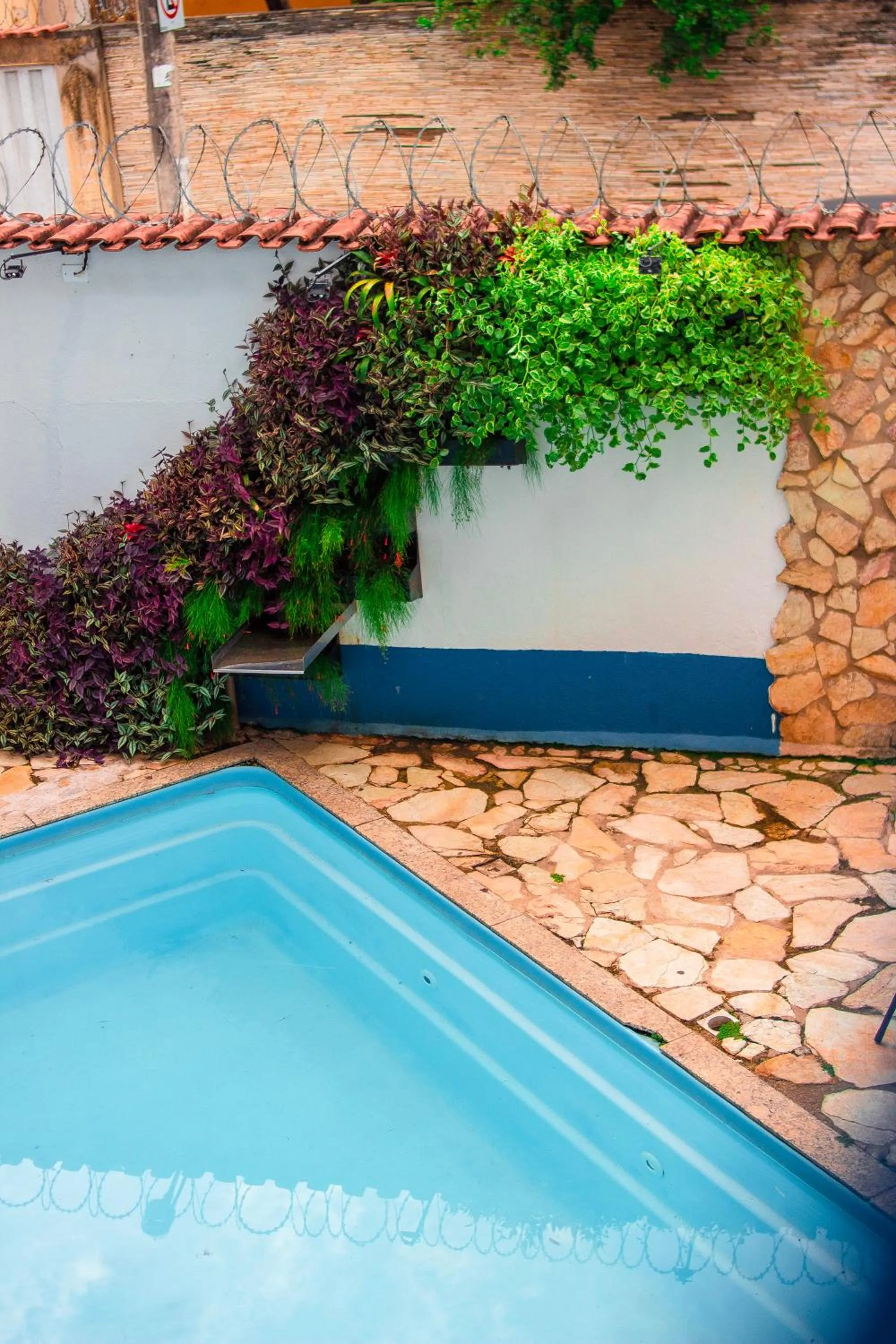 Swimming pool in Pousada Villa Real