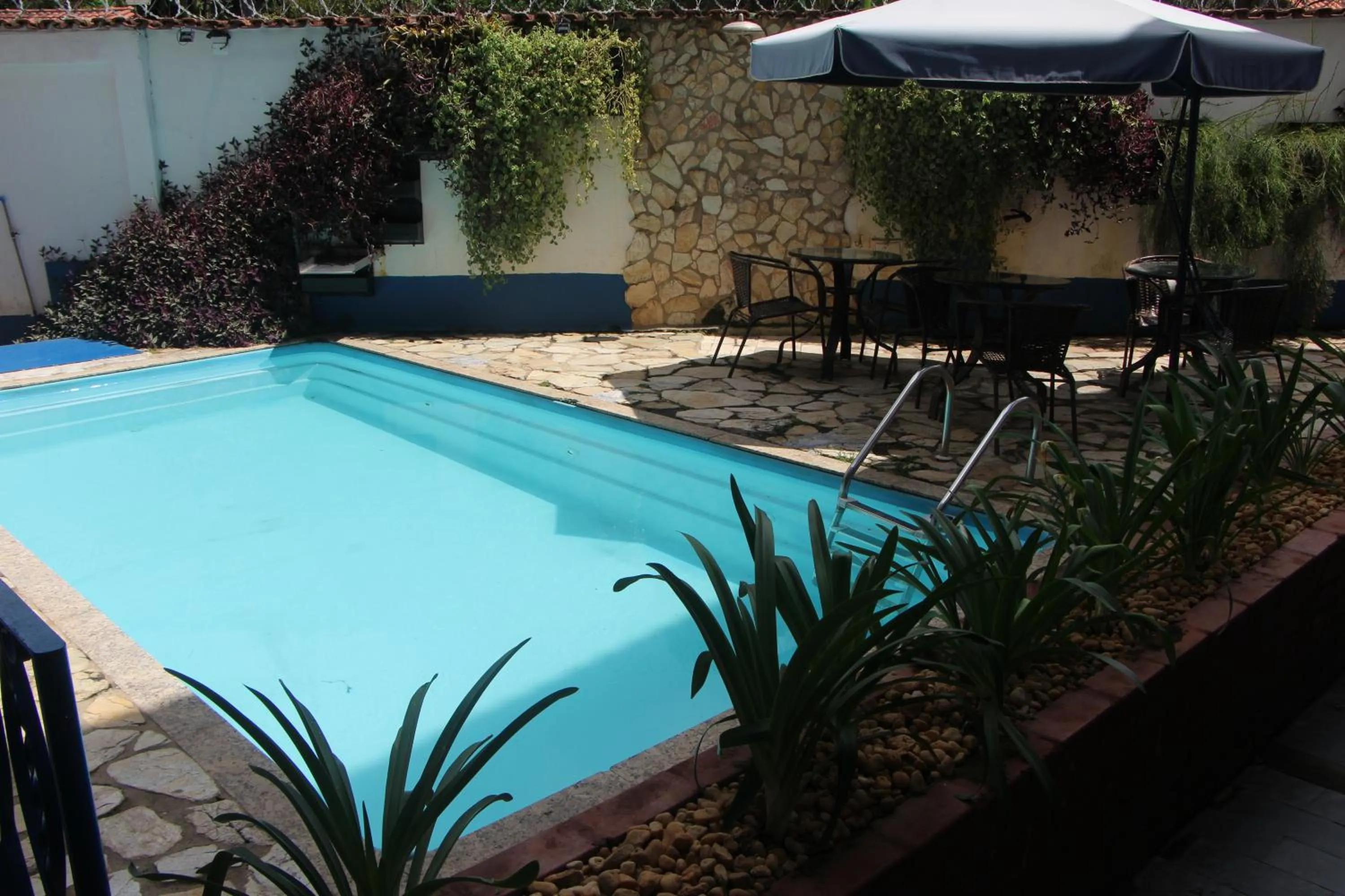 Swimming pool in Pousada Villa Real
