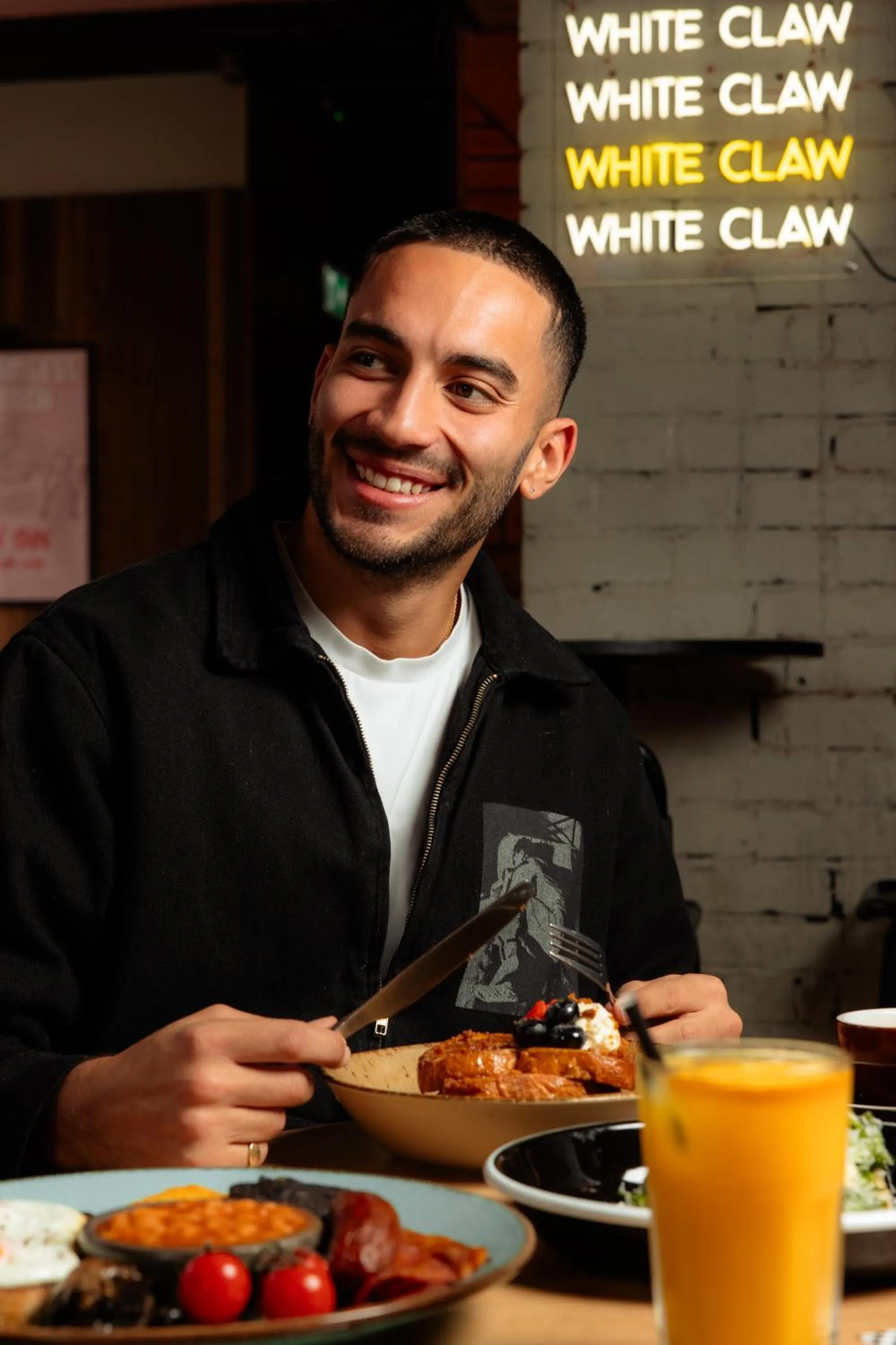 People in Malacuna Manchester