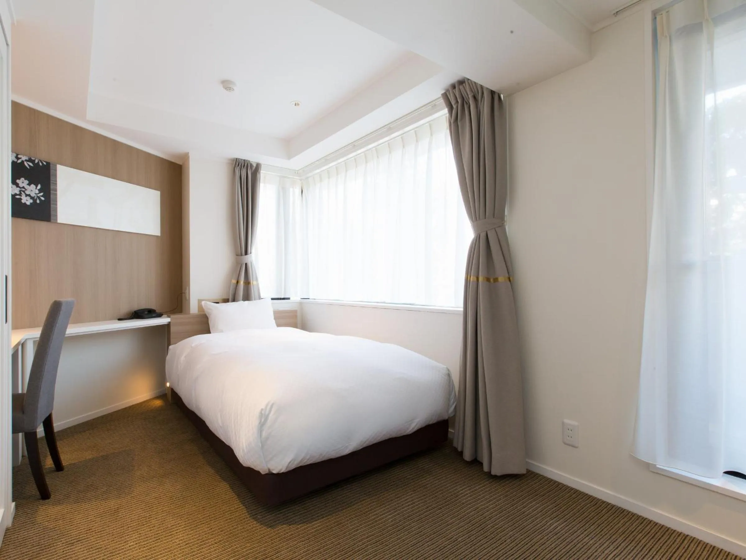 Bed in Hotel Shiki Utsubo Park