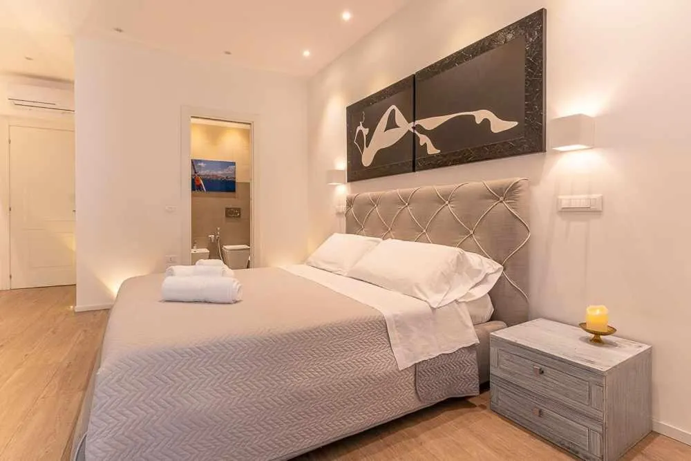 Bed in CeO LUXURY SUITE DI CAGLIARI