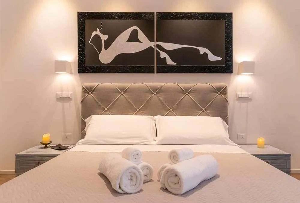Bed in CeO LUXURY SUITE DI CAGLIARI