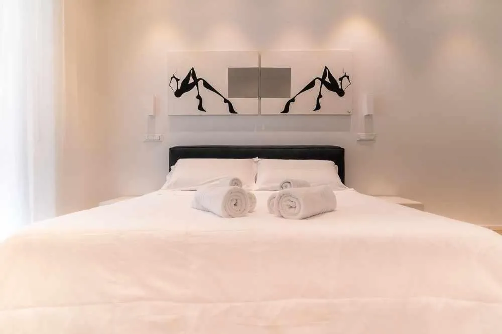Bed in CeO LUXURY SUITE DI CAGLIARI