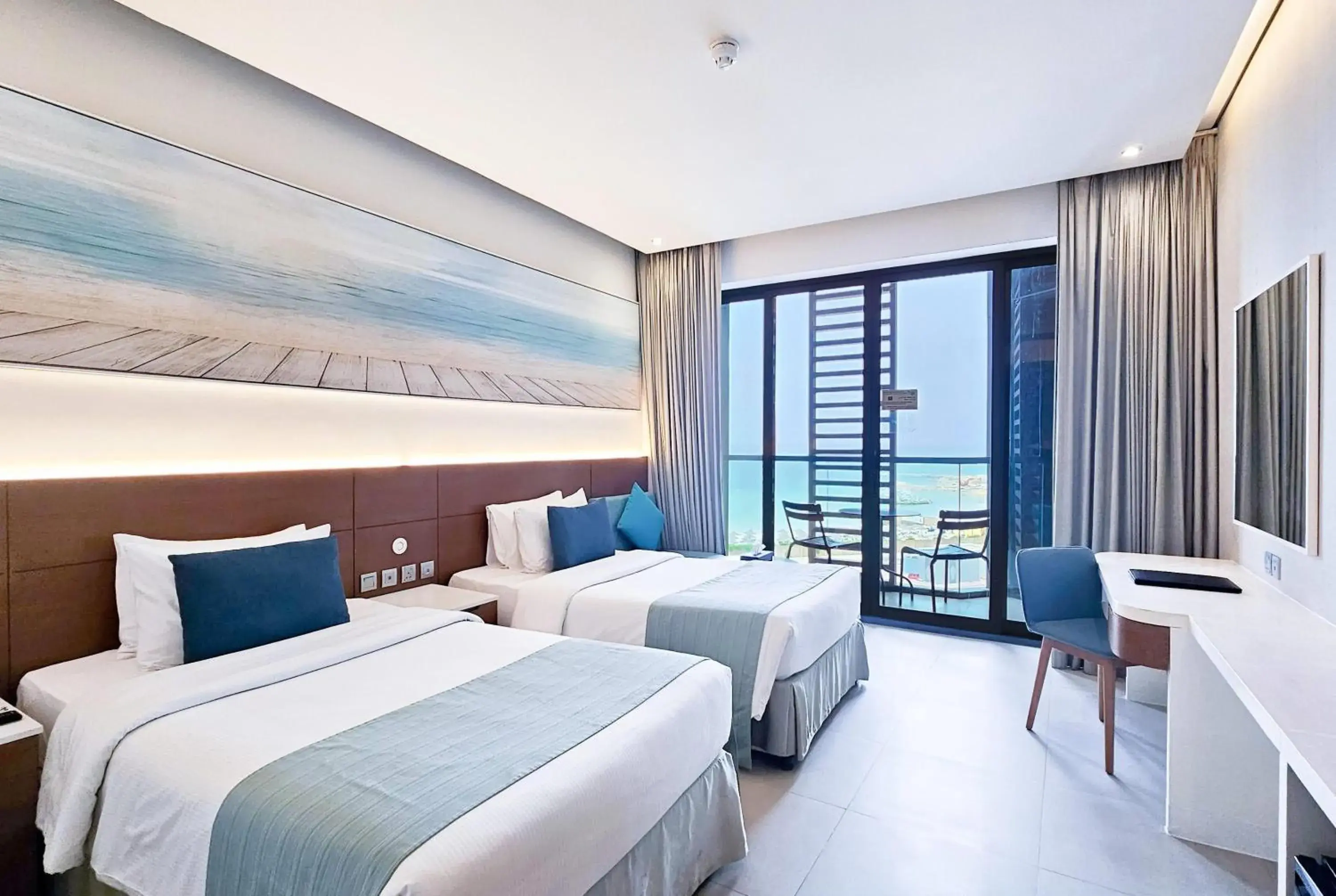 Standard Twin room Mobility Access Seaview - Non Smoking in Wyndham Garden Ajman Corniche Standard Twin room Mobility Access Seaview - Non Smoking in Wyndham Garden Ajman Corniche