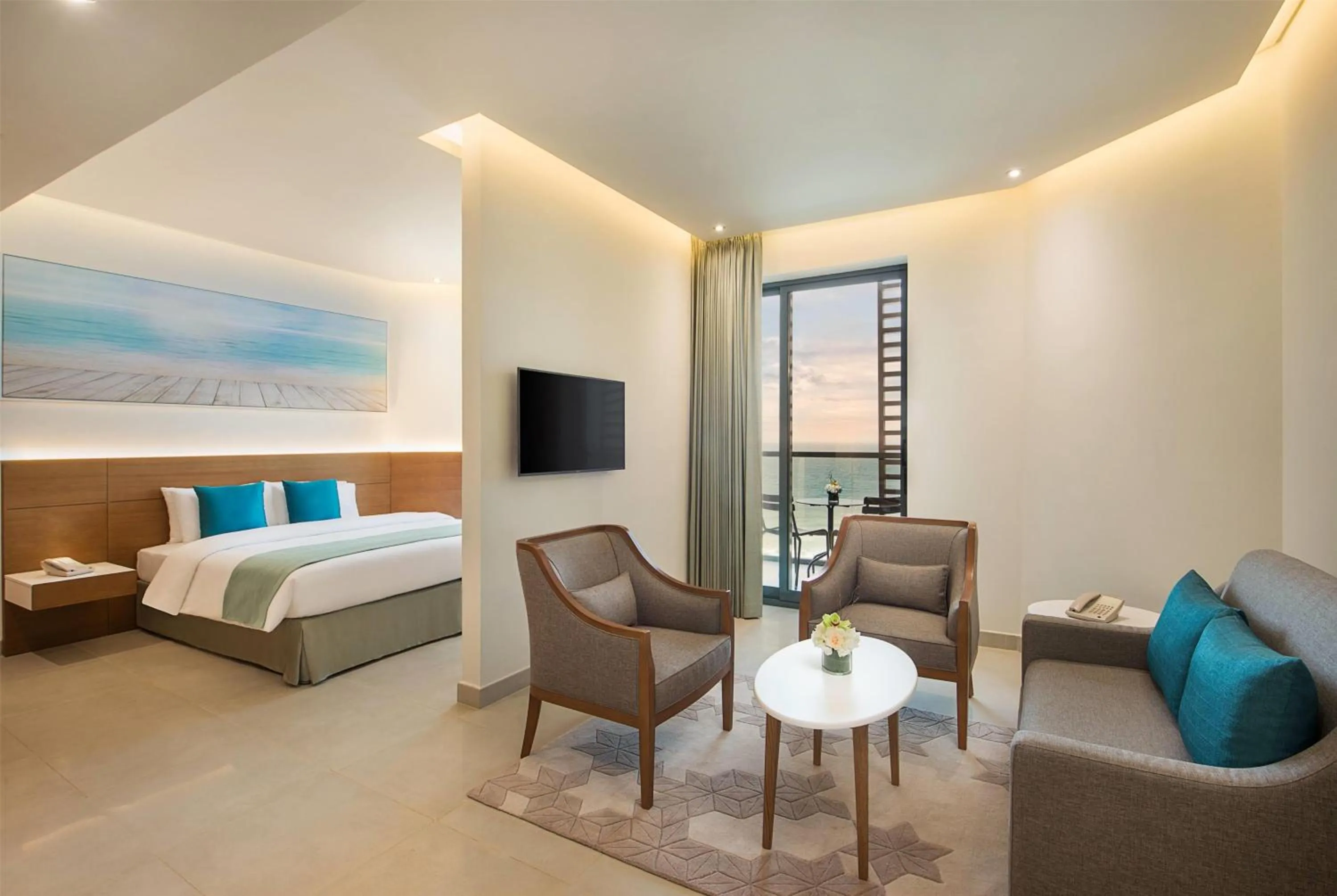 Photo of the whole room, Bed in Wyndham Garden Ajman Corniche