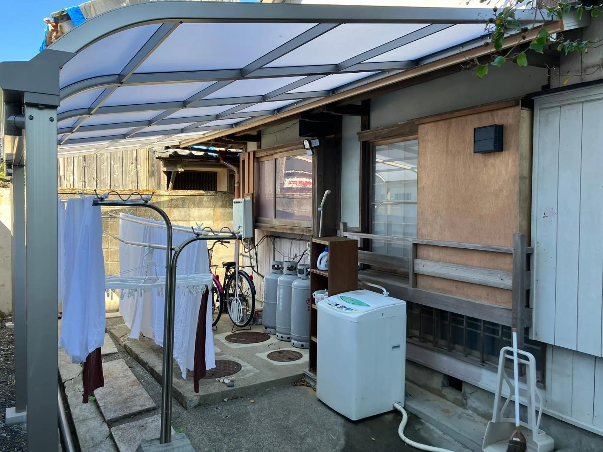 washing machine in Guest House Wagaranchi Kai