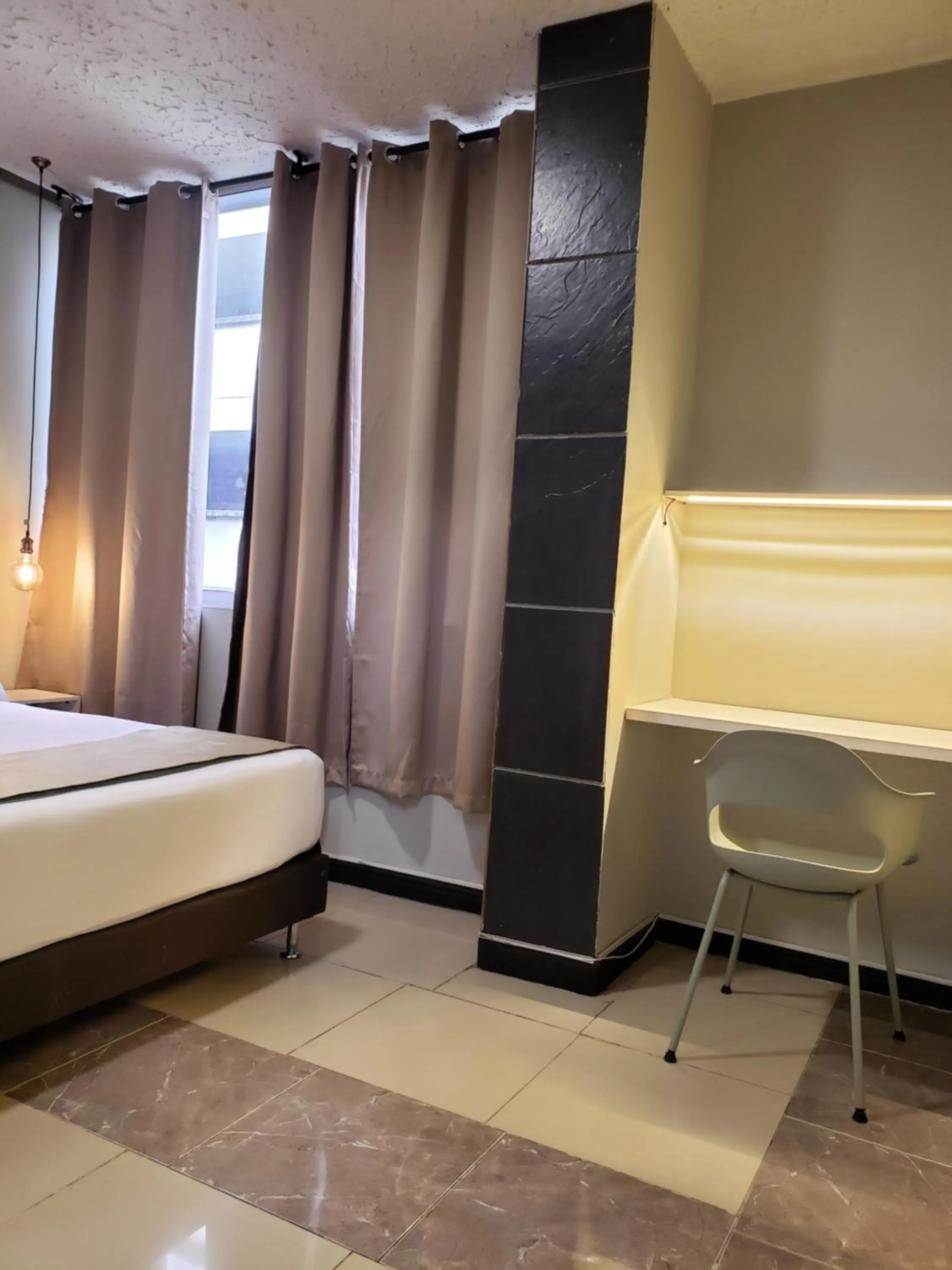 Photo of the whole room, Bed in Hotel Suite Center Pereira