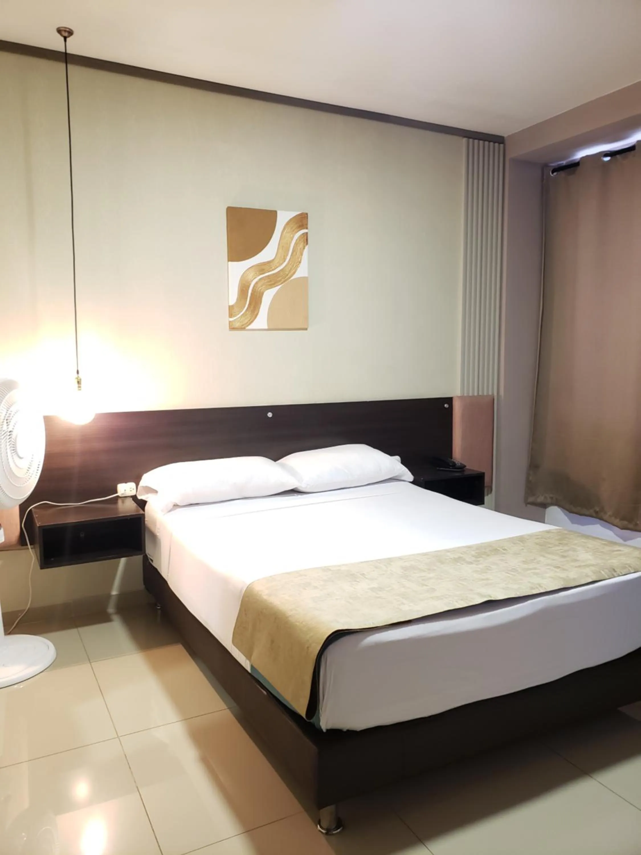 Bed in Hotel Suite Center Pereira