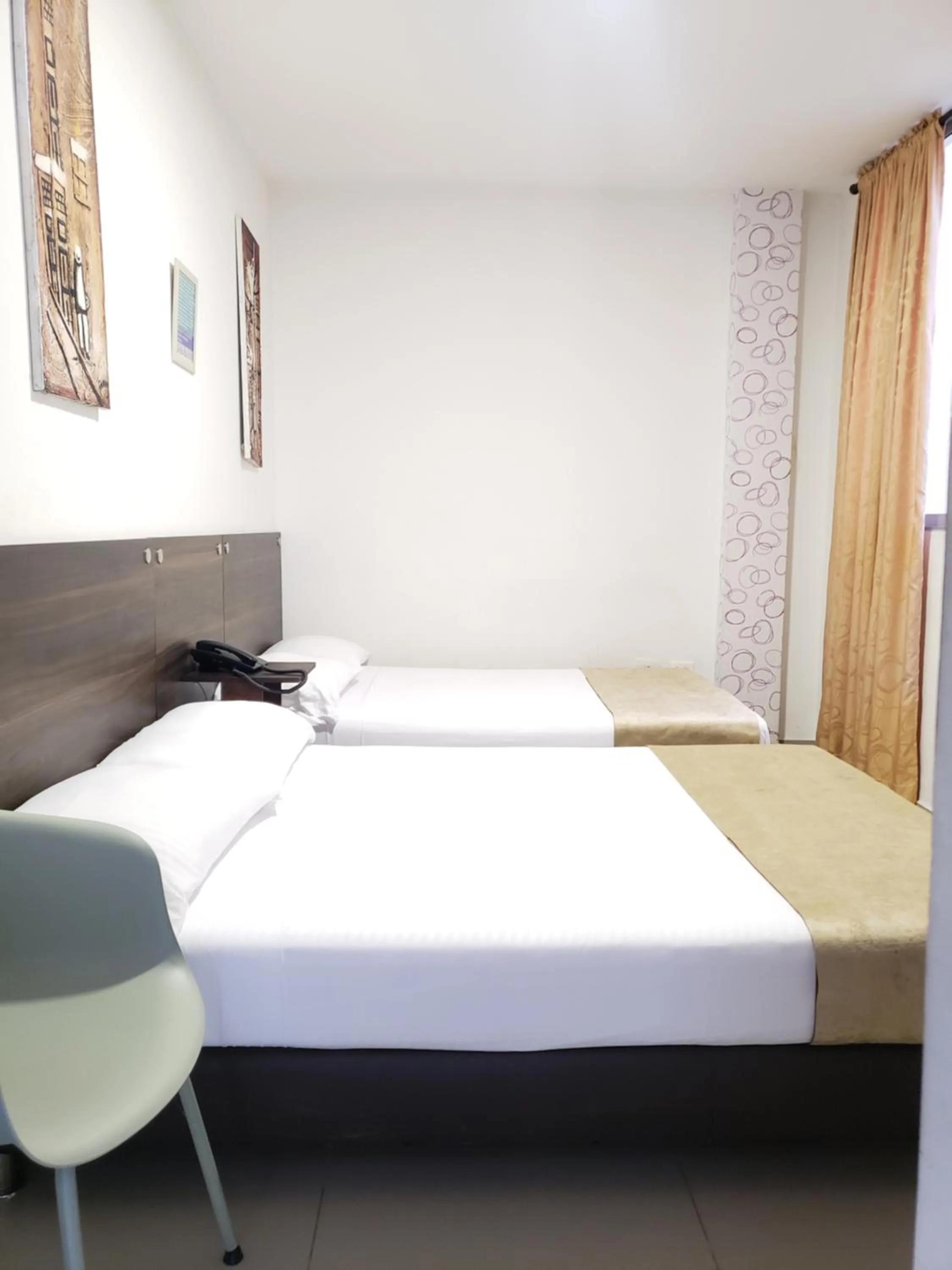 Bed in Hotel Suite Center Pereira