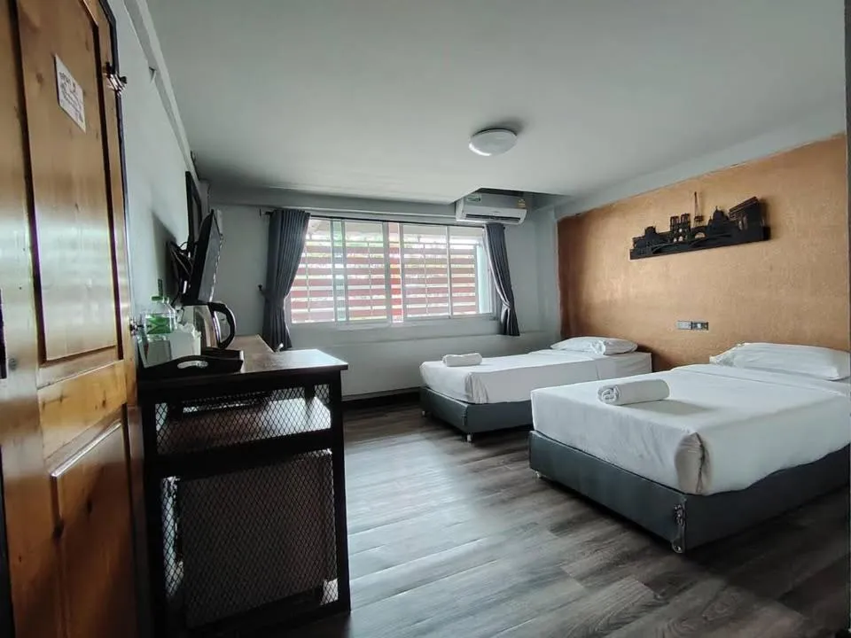 Bed in Pimpimarn Hotel