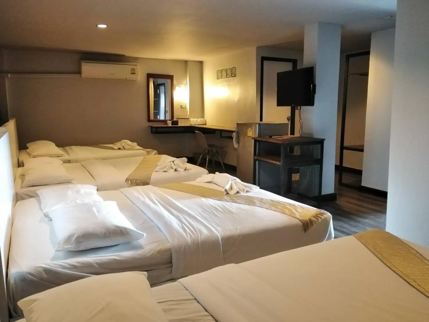 Bed in Pimpimarn Hotel