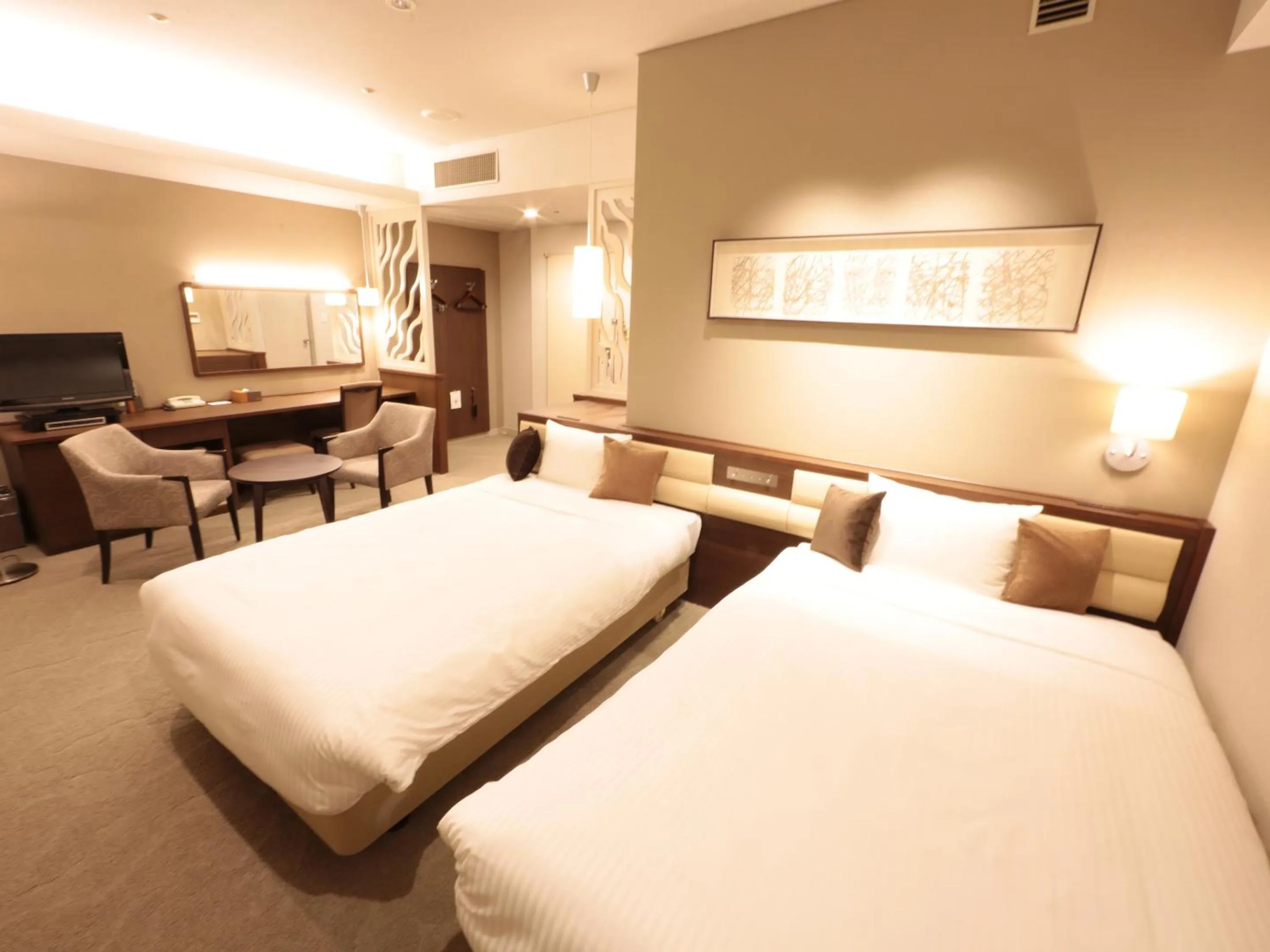 Bed in Tottori Onsen Hotel Monarque Tottori