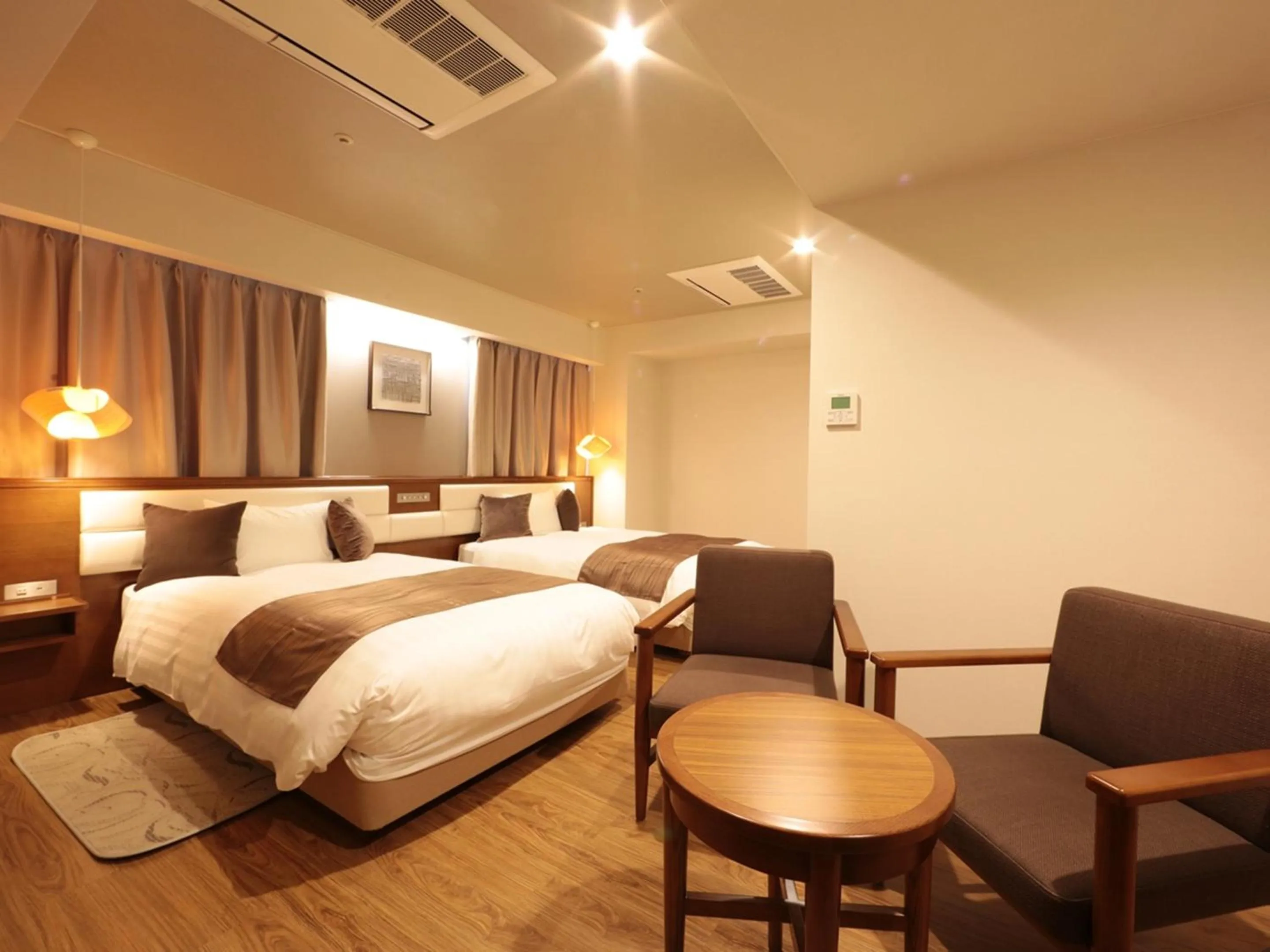 Bed in Tottori Onsen Hotel Monarque Tottori