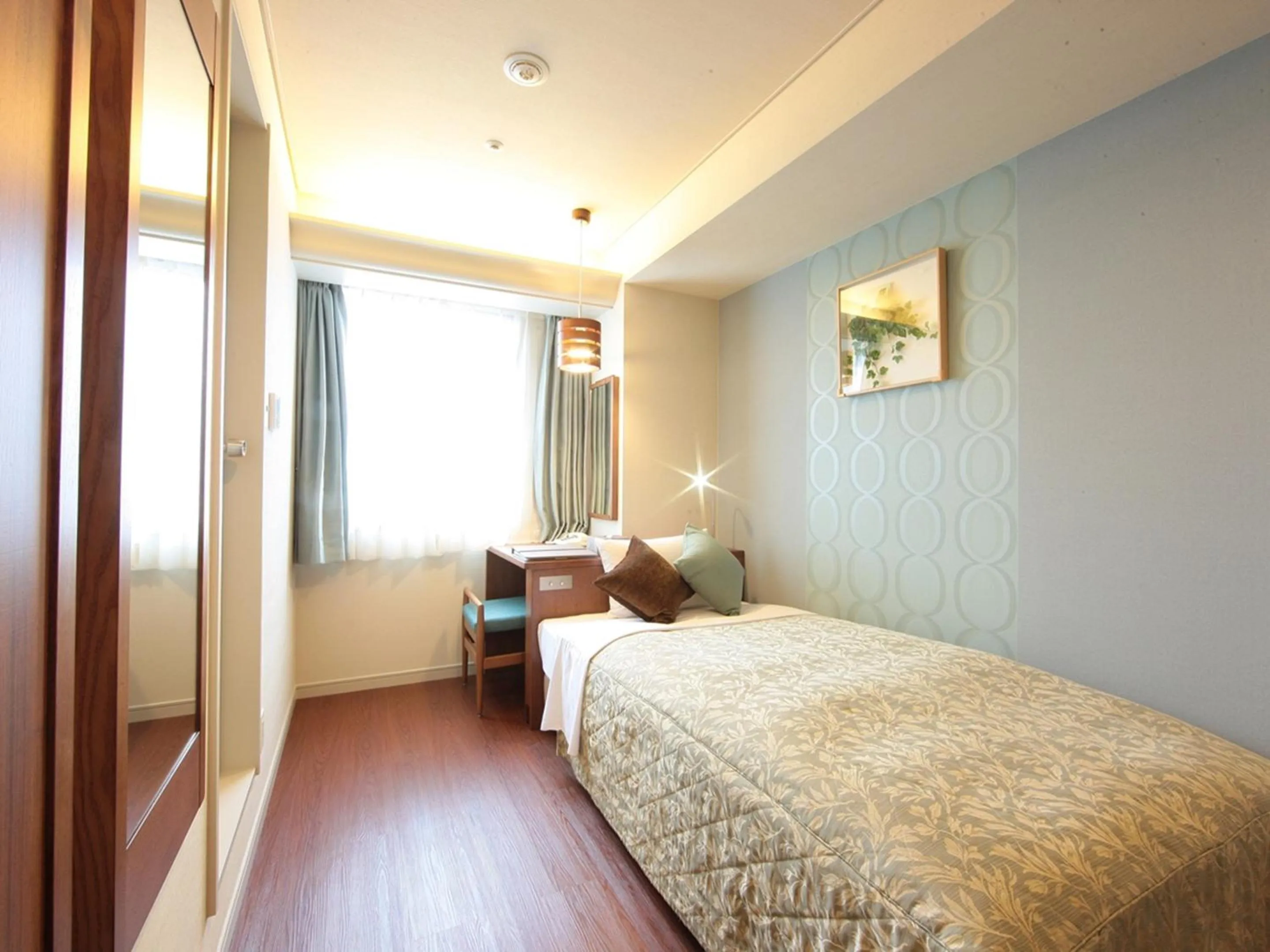 Bed in Tottori Onsen Hotel Monarque Tottori