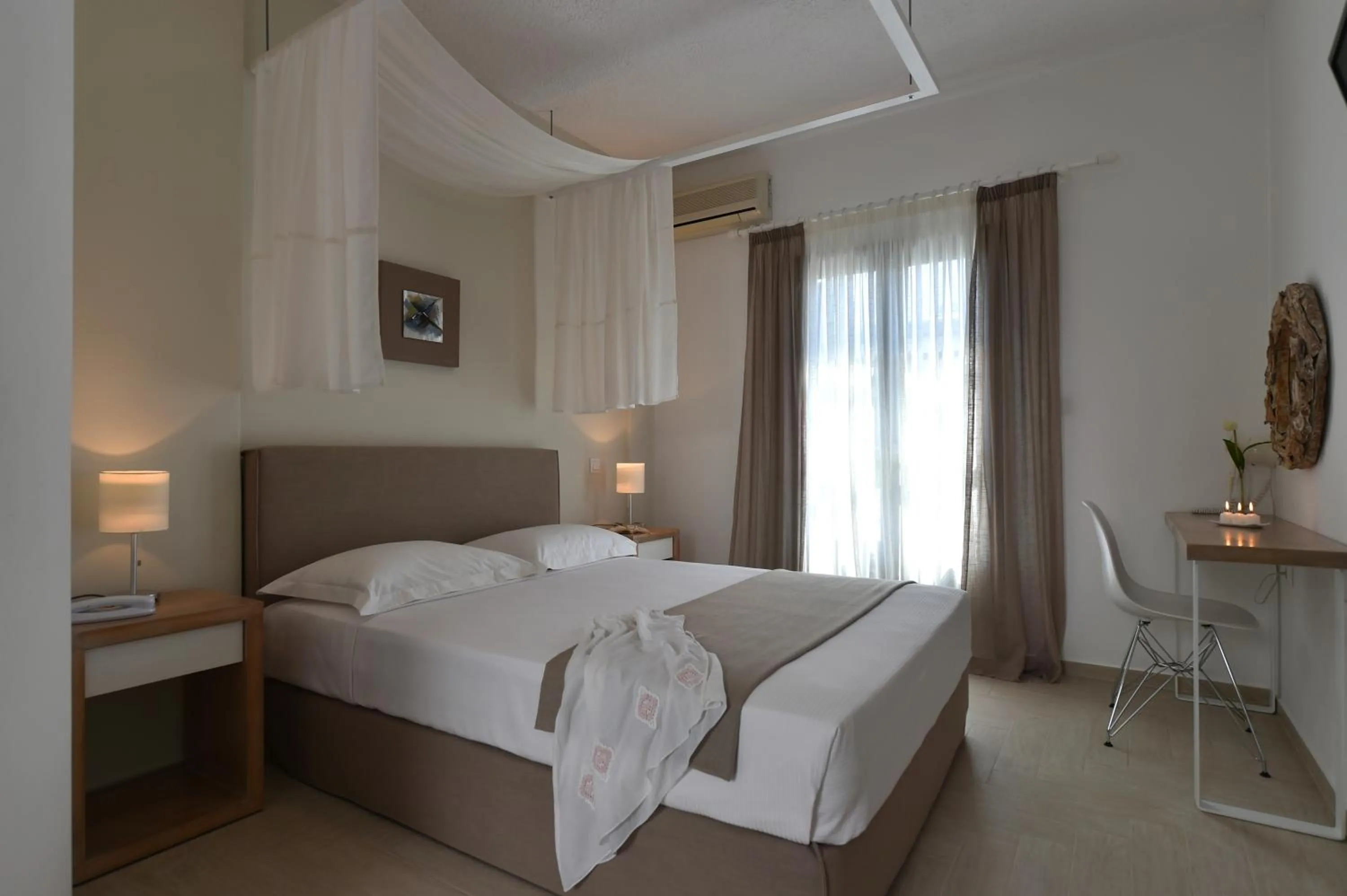 Photo of the whole room, Bed in Aella Residence